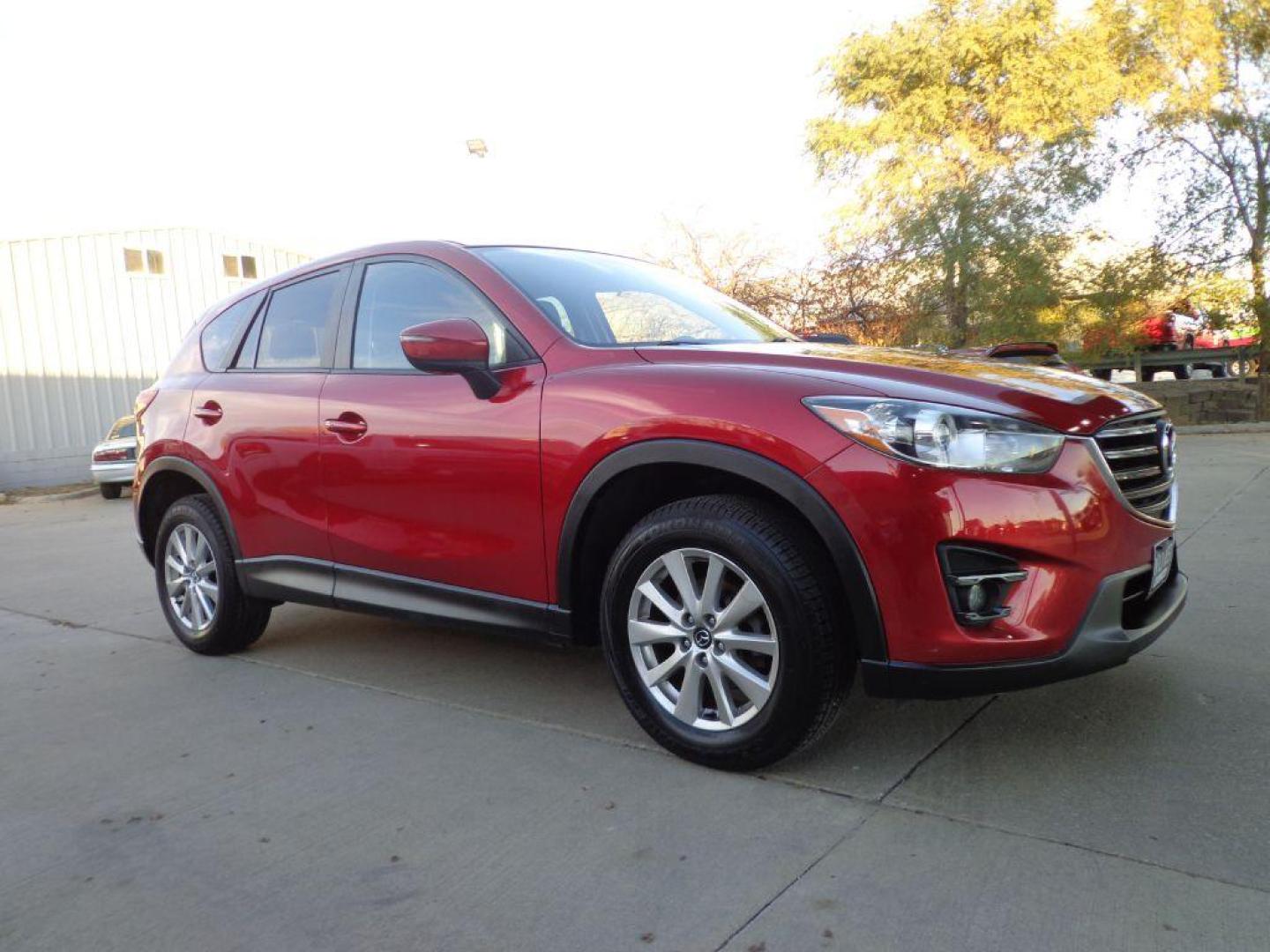2016 RED MAZDA CX-5 TOURING (JM3KE4CY2G0) with an 2.5L engine, Automatic transmission, located at 6610 L St., Omaha, NE, 68117, (402) 731-7800, 41.212872, -96.014702 - Photo#2