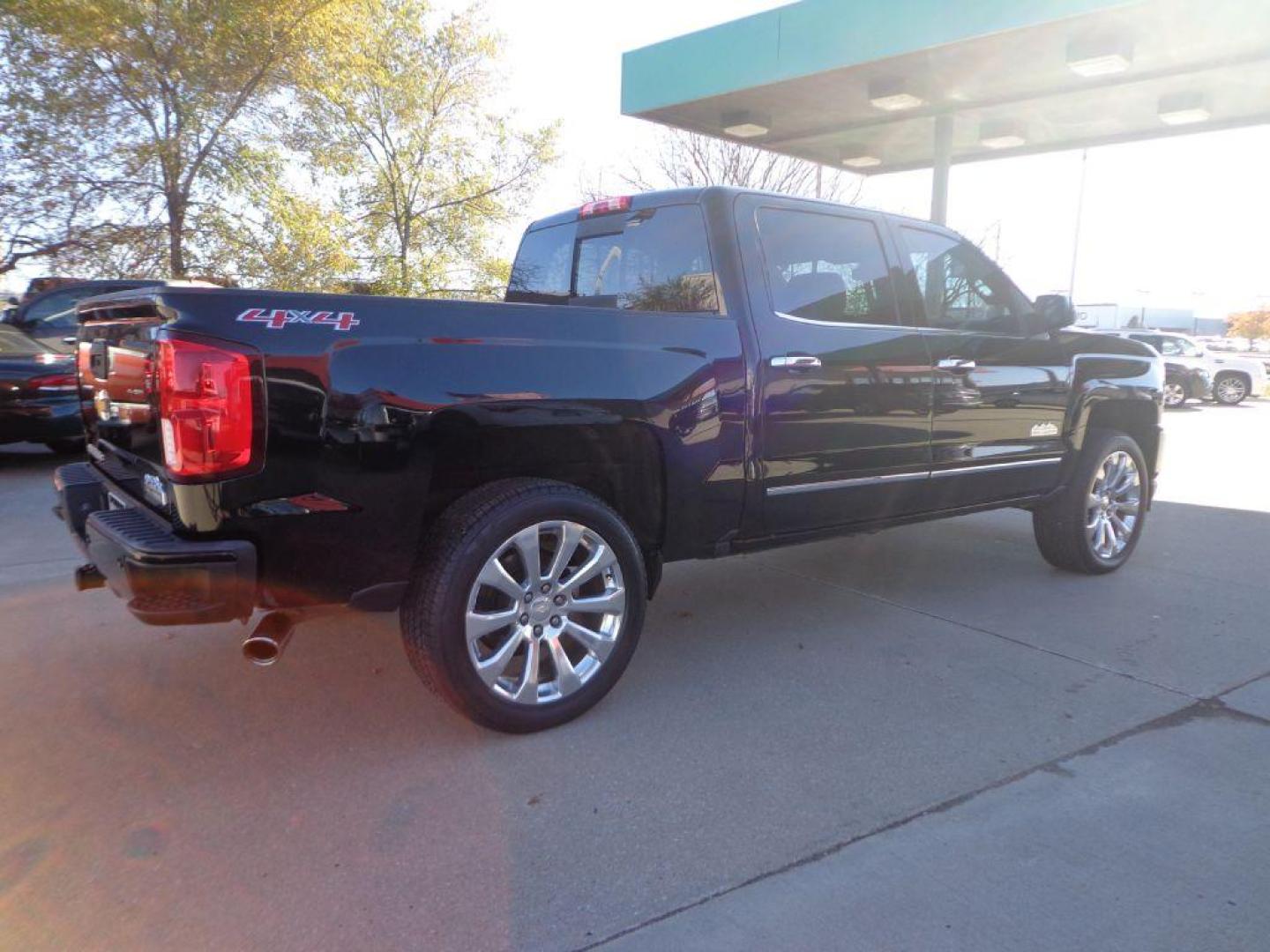 2016 BLACK CHEVROLET SILVERADO 1500 HIGH COUNTRY (3GCUKTEC6GG) with an 5.3L engine, Automatic transmission, located at 6610 L St., Omaha, NE, 68117, (402) 731-7800, 41.212872, -96.014702 - 2-OWNER, CLEAN CARFAX, LOW MILEAGE, LOADED WITH A SUNROOF, NAV, DRIVERS ASSIST AND NEWER TIRES! *****We have found that most customers do the majority of their shopping online before visiting a dealership. For this reason we feel it necessary to have a competitive price on our used vehicles rig - Photo#3