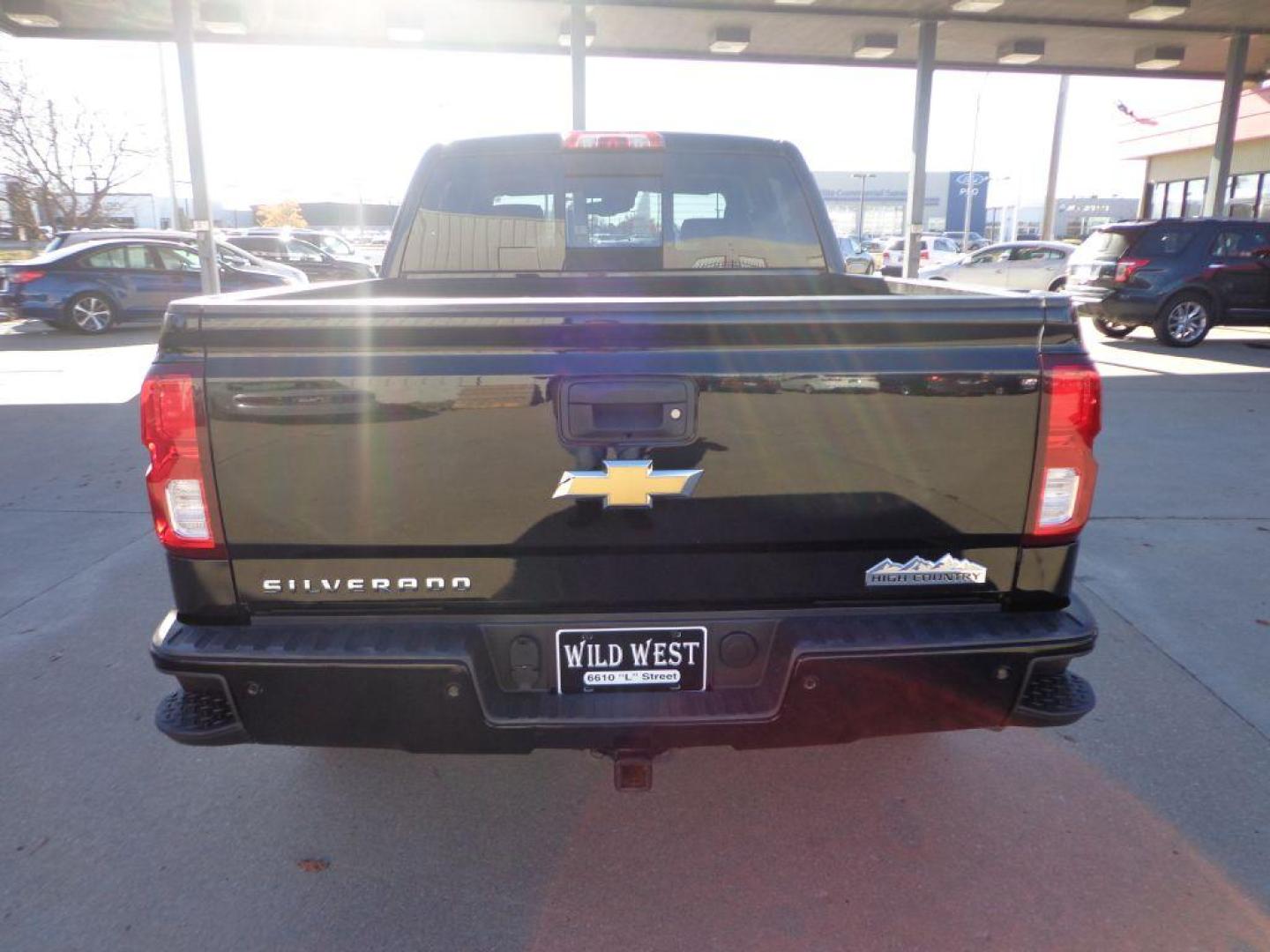 2016 BLACK CHEVROLET SILVERADO 1500 HIGH COUNTRY (3GCUKTEC6GG) with an 5.3L engine, Automatic transmission, located at 6610 L St., Omaha, NE, 68117, (402) 731-7800, 41.212872, -96.014702 - 2-OWNER, CLEAN CARFAX, LOW MILEAGE, LOADED WITH A SUNROOF, NAV, DRIVERS ASSIST AND NEWER TIRES! *****We have found that most customers do the majority of their shopping online before visiting a dealership. For this reason we feel it necessary to have a competitive price on our used vehicles rig - Photo#4