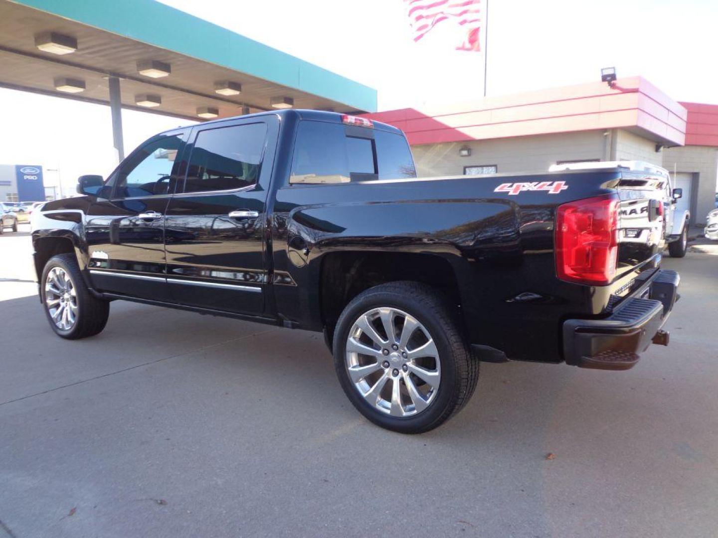 2016 BLACK CHEVROLET SILVERADO 1500 HIGH COUNTRY (3GCUKTEC6GG) with an 5.3L engine, Automatic transmission, located at 6610 L St., Omaha, NE, 68117, (402) 731-7800, 41.212872, -96.014702 - 2-OWNER, CLEAN CARFAX, LOW MILEAGE, LOADED WITH A SUNROOF, NAV, DRIVERS ASSIST AND NEWER TIRES! *****We have found that most customers do the majority of their shopping online before visiting a dealership. For this reason we feel it necessary to have a competitive price on our used vehicles rig - Photo#5