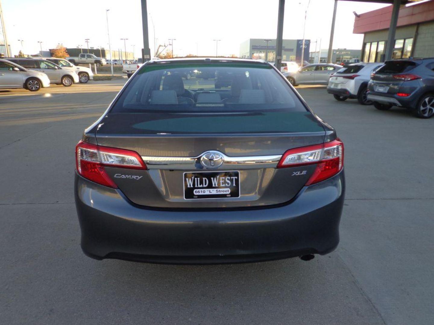 2014 GRAY TOYOTA CAMRY XLE (4T1BF1FK4EU) with an 2.5L engine, Automatic transmission, located at 6610 L St., Omaha, NE, 68117, (402) 731-7800, 41.212872, -96.014702 - 2-OWNER, CLEAN CARFAX, LOW MILEAGE WITH A SUNROOF, HEATED LEATHER, BLIND SPOT ASSIST, BACKUP CAM, BLUETOOTH, ALL WEATHER MATS AND NEWER TIRES! *****We have found that most customers do the majority of their shopping online before visiting a dealership. For this reason we feel it necessary to - Photo#4