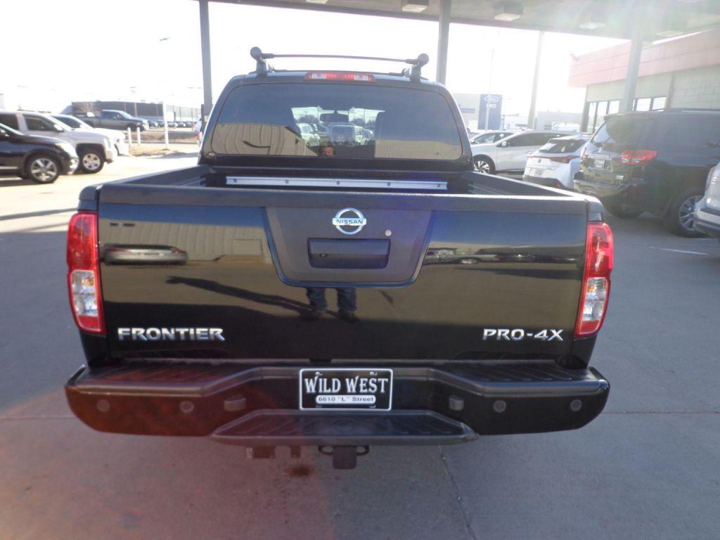 2013 BLACK NISSAN FRONTIER PRO-4X (1N6AD0EV6DN) with an 4.0L engine, Automatic transmission, located at 6610 L St., Omaha, NE, 68117, (402) 731-7800, 41.212872, -96.014702 - SHARP PRO-4X WITH LOW MILEAGE, HEATED LEATHER, NAV, BACKUP CAM, SUNROOF AND NEWER TIRES! *****We have found that most customers do the majority of their shopping online before visiting a dealership. For this reason we feel it necessary to have a competitive price on our used vehicles right up - Photo#4