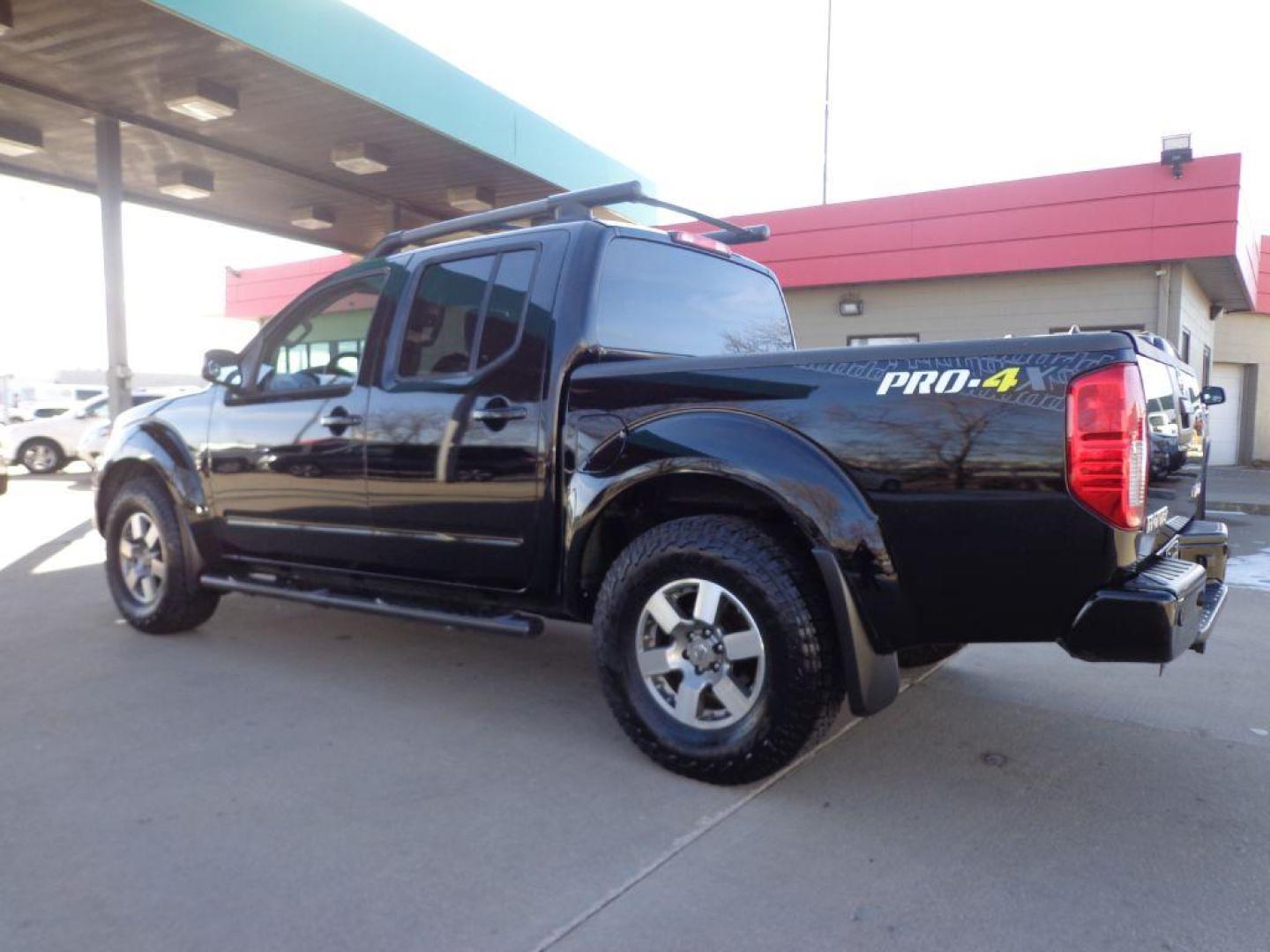 2013 BLACK NISSAN FRONTIER PRO-4X (1N6AD0EV6DN) with an 4.0L engine, Automatic transmission, located at 6610 L St., Omaha, NE, 68117, (402) 731-7800, 41.212872, -96.014702 - SHARP PRO-4X WITH LOW MILEAGE, HEATED LEATHER, NAV, BACKUP CAM, SUNROOF AND NEWER TIRES! *****We have found that most customers do the majority of their shopping online before visiting a dealership. For this reason we feel it necessary to have a competitive price on our used vehicles right up - Photo#5