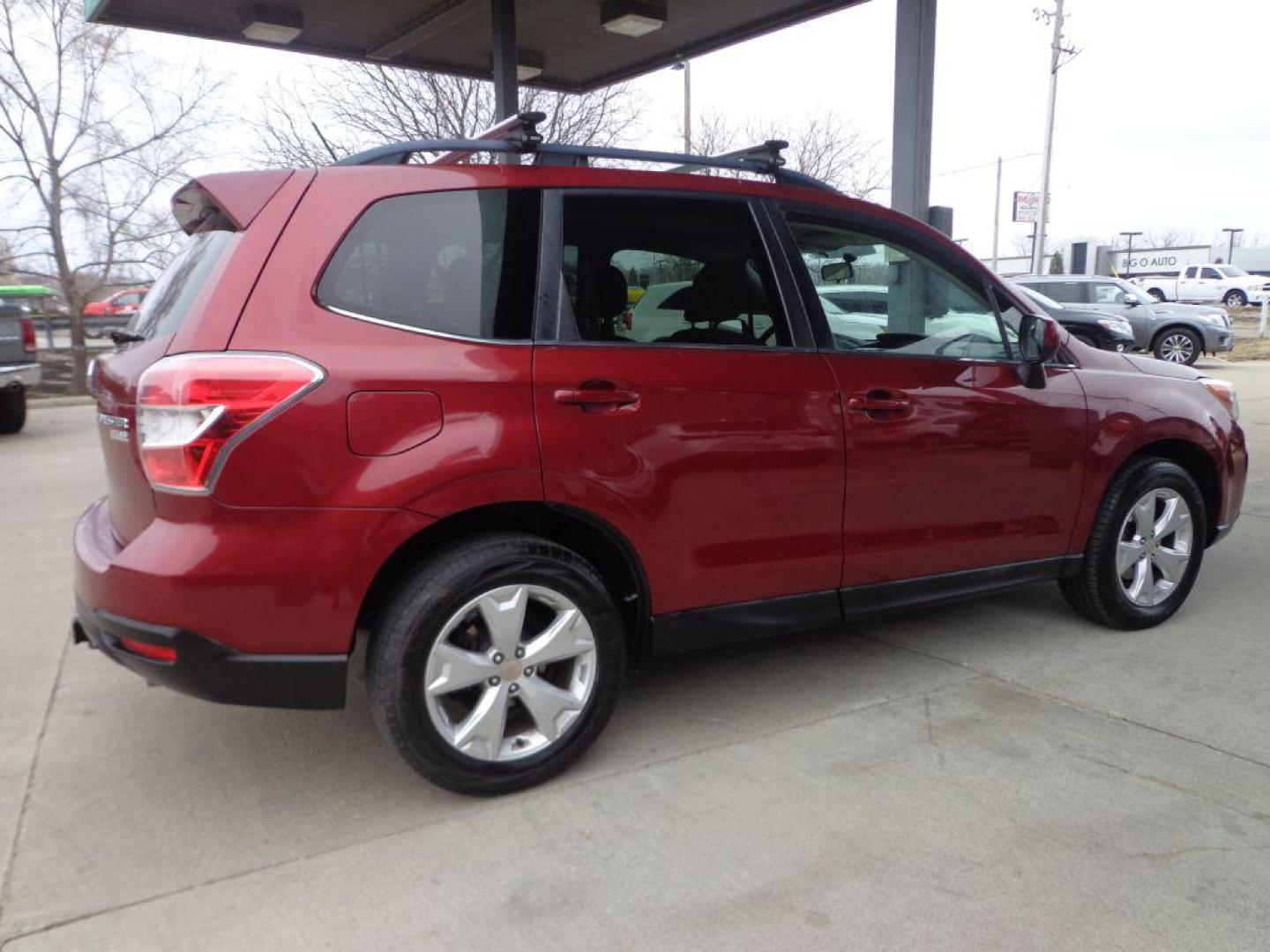 2014 RED SUBARU FORESTER 2.5I LIMITED (JF2SJAHC1EH) with an 2.5L engine, Continuously Variable transmission, located at 6610 L St., Omaha, NE, 68117, (402) 731-7800, 41.212872, -96.014702 - Photo#3