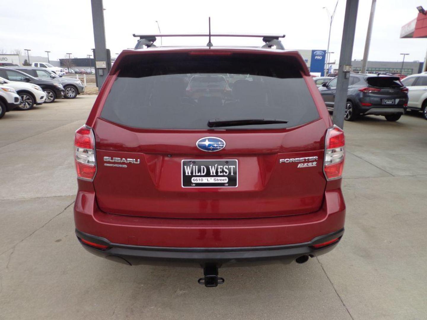 2014 RED SUBARU FORESTER 2.5I LIMITED (JF2SJAHC1EH) with an 2.5L engine, Continuously Variable transmission, located at 6610 L St., Omaha, NE, 68117, (402) 731-7800, 41.212872, -96.014702 - Photo#4