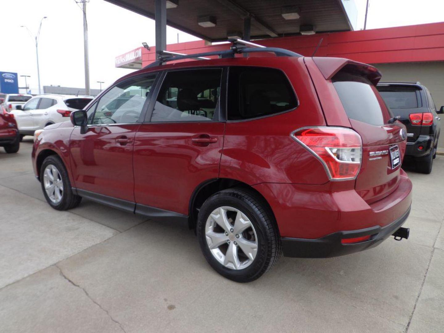 2014 RED SUBARU FORESTER 2.5I LIMITED (JF2SJAHC1EH) with an 2.5L engine, Continuously Variable transmission, located at 6610 L St., Omaha, NE, 68117, (402) 731-7800, 41.212872, -96.014702 - Photo#5