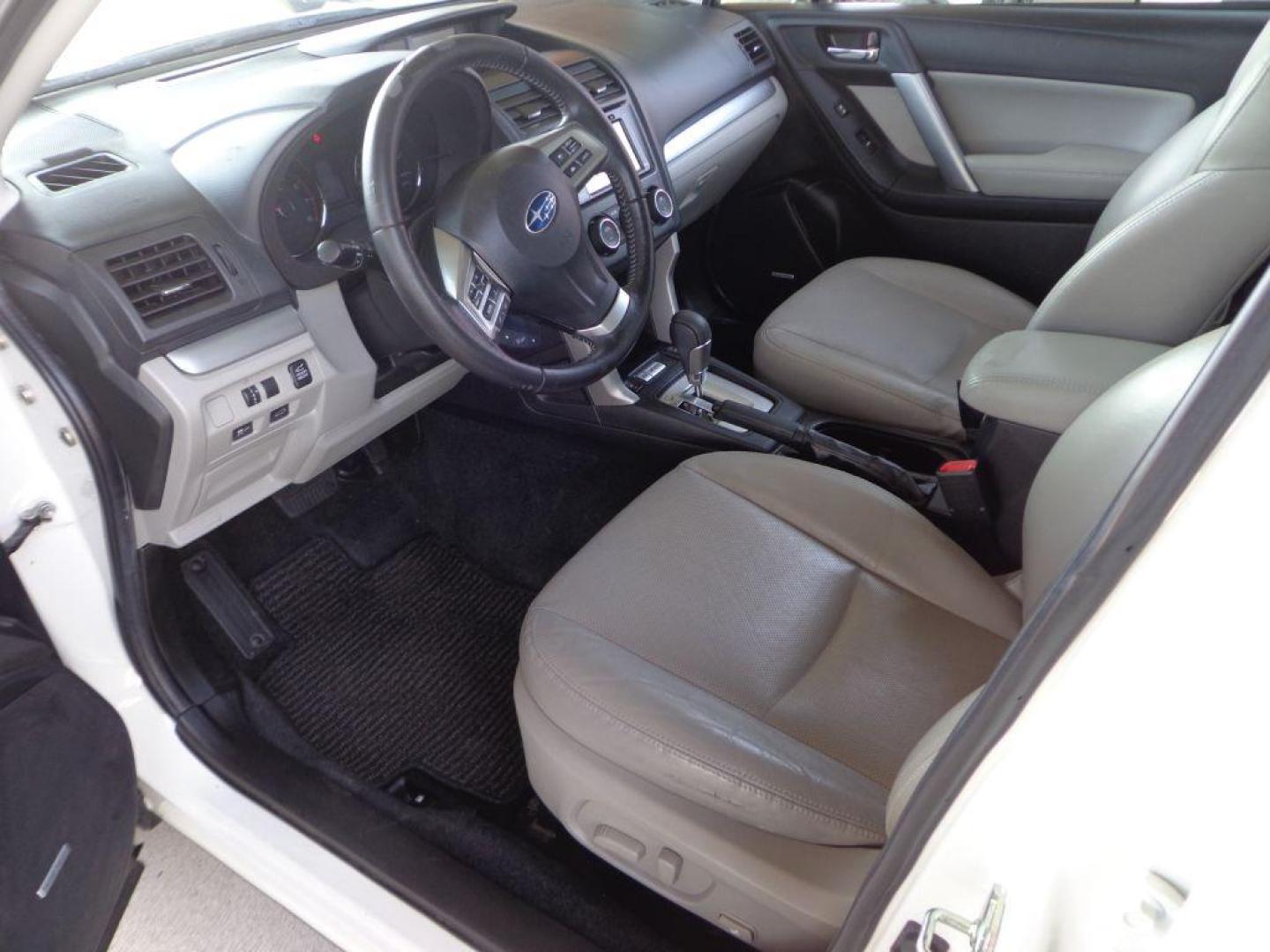 2014 WHITE SUBARU FORESTER 2.5I TOURING (JF2SJAPC9EH) with an 2.5L engine, Continuously Variable transmission, located at 6610 L St., Omaha, NE, 68117, (402) 731-7800, 41.212872, -96.014702 - TOURING MODEL W/ EYESIGHT, NAV, BACKUP CAM, SUNROOF, NEWER TIRES AND MUCH MORE! *****We have found that most customers do the majority of their shopping online before visiting a dealership. For this reason we feel it necessary to have a competitive price on our used vehicles right up front. W - Photo#13