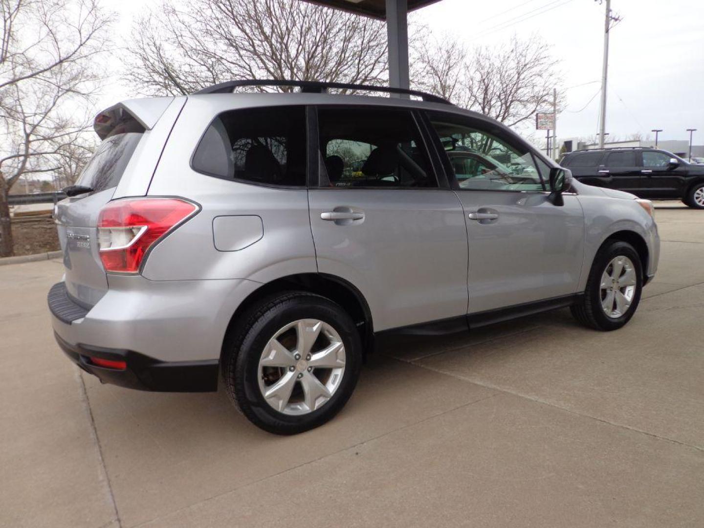 2014 SILVER SUBARU FORESTER 2.5I TOURING (JF2SJAMC4EH) with an 2.5L engine, Continuously Variable transmission, located at 6610 L St., Omaha, NE, 68117, (402) 731-7800, 41.212872, -96.014702 - 1-OWNER, CLEAN CARFAX, LOW MILEAGE, NAV, BACKUP CAM, HEATED LEATHER, SUNROOF AND NEWER TIRES! *****We have found that most customers do the majority of their shopping online before visiting a dealership. For this reason we feel it necessary to have a competitive price on our used vehicles rig - Photo#3