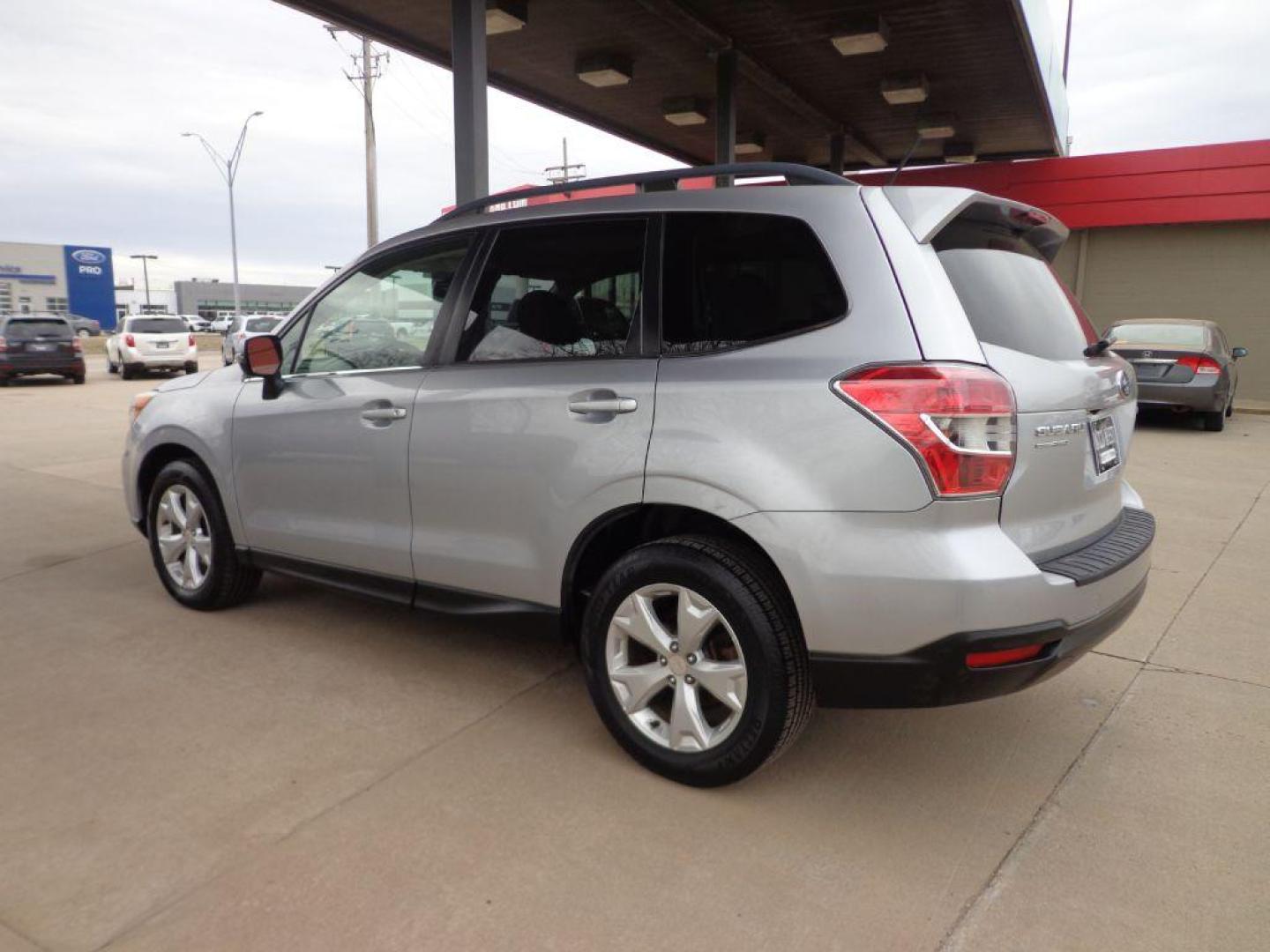 2014 SILVER SUBARU FORESTER 2.5I TOURING (JF2SJAMC4EH) with an 2.5L engine, Continuously Variable transmission, located at 6610 L St., Omaha, NE, 68117, (402) 731-7800, 41.212872, -96.014702 - 1-OWNER, CLEAN CARFAX, LOW MILEAGE, NAV, BACKUP CAM, HEATED LEATHER, SUNROOF AND NEWER TIRES! *****We have found that most customers do the majority of their shopping online before visiting a dealership. For this reason we feel it necessary to have a competitive price on our used vehicles rig - Photo#5