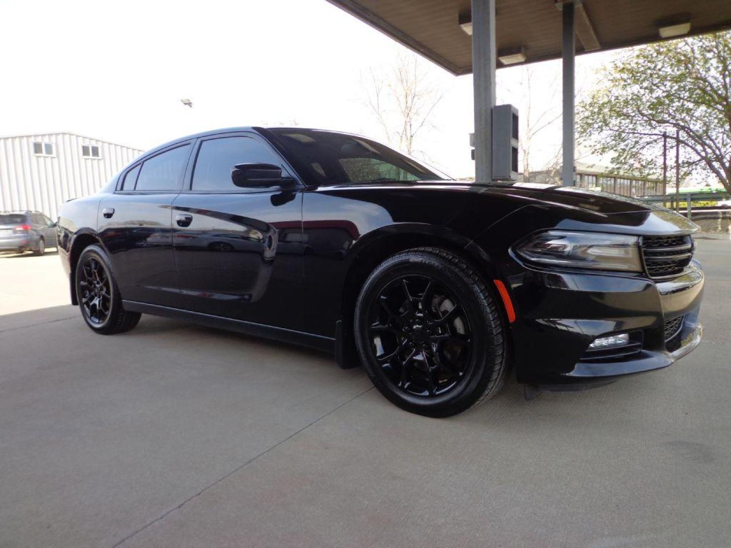 2015 BLACK DODGE CHARGER SXT PLUS (2C3CDXJG7FH) with an 3.6L engine, Automatic transmission, located at 6610 L St., Omaha, NE, 68117, (402) 731-7800, 41.212872, -96.014702 - SHARP SXT PLUS RALLYE WITH A CLEAN CARFAX, LOW MILEAGE, NAV, BACKUP CAM, BEATS AUDIO, HEATED WHEEL, HEATED/COOLED SEATS FRONT SEATS, HEATED REAR SEATS, PARK ASSIST, REMOTE START AND NEWER TIRES! *****We have found that most customers do the majority of their shopping online before visiting a - Photo#2