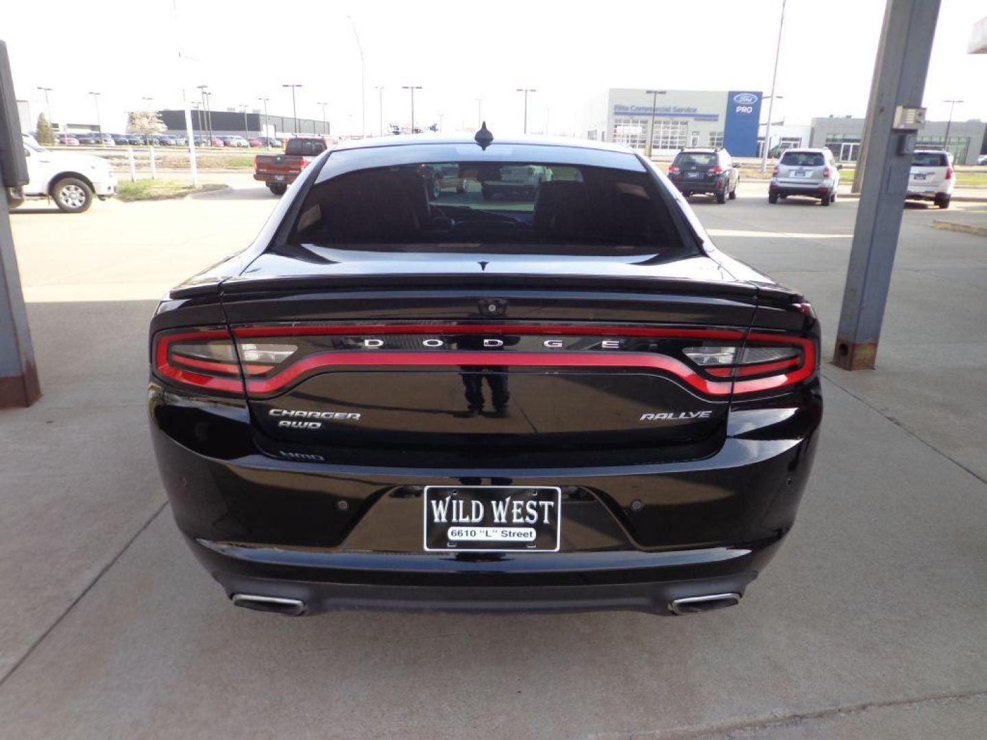 2015 BLACK DODGE CHARGER SXT PLUS (2C3CDXJG7FH) with an 3.6L engine, Automatic transmission, located at 6610 L St., Omaha, NE, 68117, (402) 731-7800, 41.212872, -96.014702 - SHARP SXT PLUS RALLYE WITH A CLEAN CARFAX, LOW MILEAGE, NAV, BACKUP CAM, BEATS AUDIO, HEATED WHEEL, HEATED/COOLED SEATS FRONT SEATS, HEATED REAR SEATS, PARK ASSIST, REMOTE START AND NEWER TIRES! *****We have found that most customers do the majority of their shopping online before visiting a - Photo#4