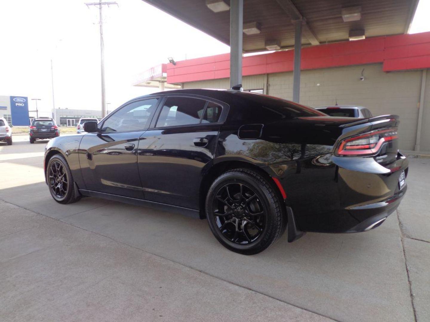 2015 BLACK DODGE CHARGER SXT PLUS (2C3CDXJG7FH) with an 3.6L engine, Automatic transmission, located at 6610 L St., Omaha, NE, 68117, (402) 731-7800, 41.212872, -96.014702 - SHARP SXT PLUS RALLYE WITH A CLEAN CARFAX, LOW MILEAGE, NAV, BACKUP CAM, BEATS AUDIO, HEATED WHEEL, HEATED/COOLED SEATS FRONT SEATS, HEATED REAR SEATS, PARK ASSIST, REMOTE START AND NEWER TIRES! *****We have found that most customers do the majority of their shopping online before visiting a - Photo#5