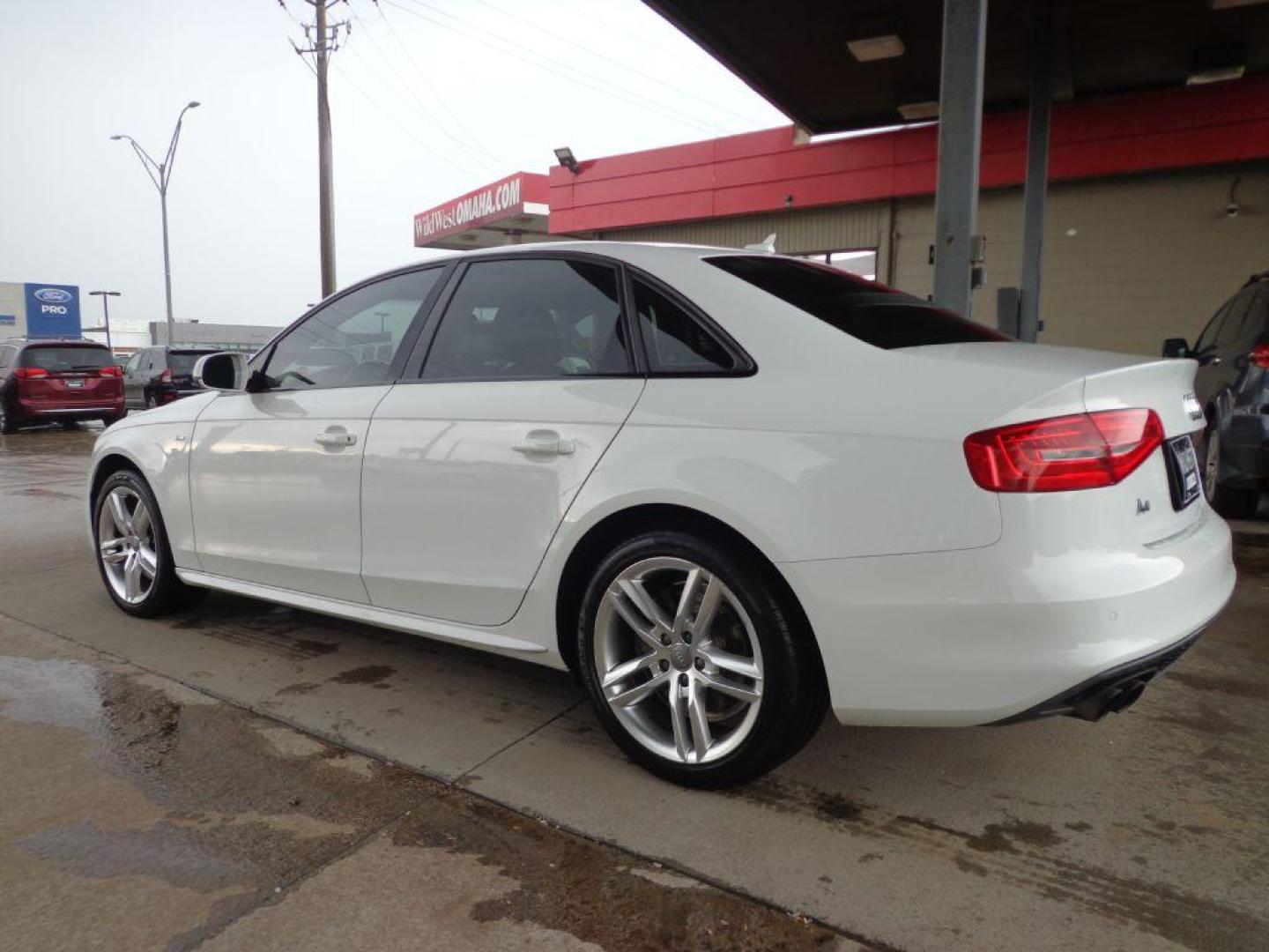2016 WHITE AUDI A4 PREMIUM S-LINE (WAUBFAFL3GN) with an 2.0L engine, Automatic transmission, located at 6610 L St., Omaha, NE, 68117, (402) 731-7800, 41.212872, -96.014702 - LOW MILE S-LINE PACKAGE WITH TECHNOLOGY PACKAGE AND NEWER TIRES! *****We have found that most customers do the majority of their shopping online before visiting a dealership. For this reason we feel it necessary to have a competitive price on our used vehicles right up front. We spend time re - Photo#5