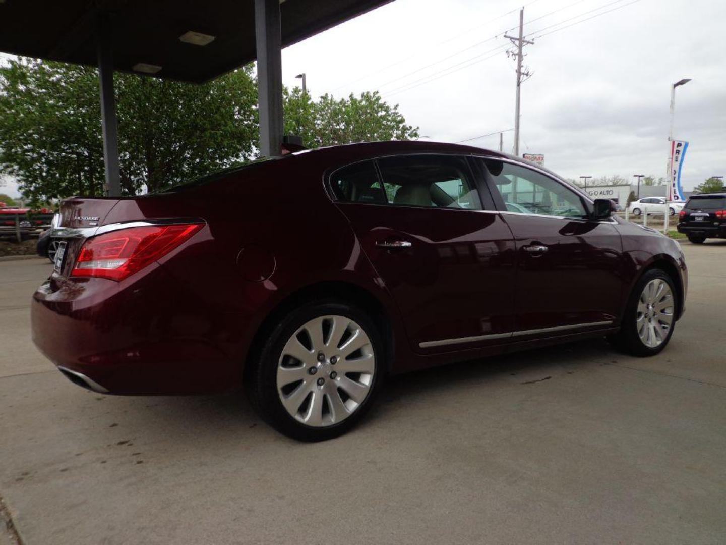 2016 RED BUICK LACROSSE (1G4GC5G37GF) with an 3.6L engine, Automatic transmission, located at 6610 L St., Omaha, NE, 68117, (402) 731-7800, 41.212872, -96.014702 - 1-OWNER, CLEAN CARFAX, LOW MILEAGE, AWD, SUNROOF, HEATED SEATS, NAV, BACKUP CAM, BOSE AUDIO, REMOTE START AND NEWER TIRES! THIS VEHICLE HAS A CLEAN TITLE WITH A FREE CARFAX PROVIDED! *****We have found that most customers do the majority of their shopping online before visiting a dealership. F - Photo#3