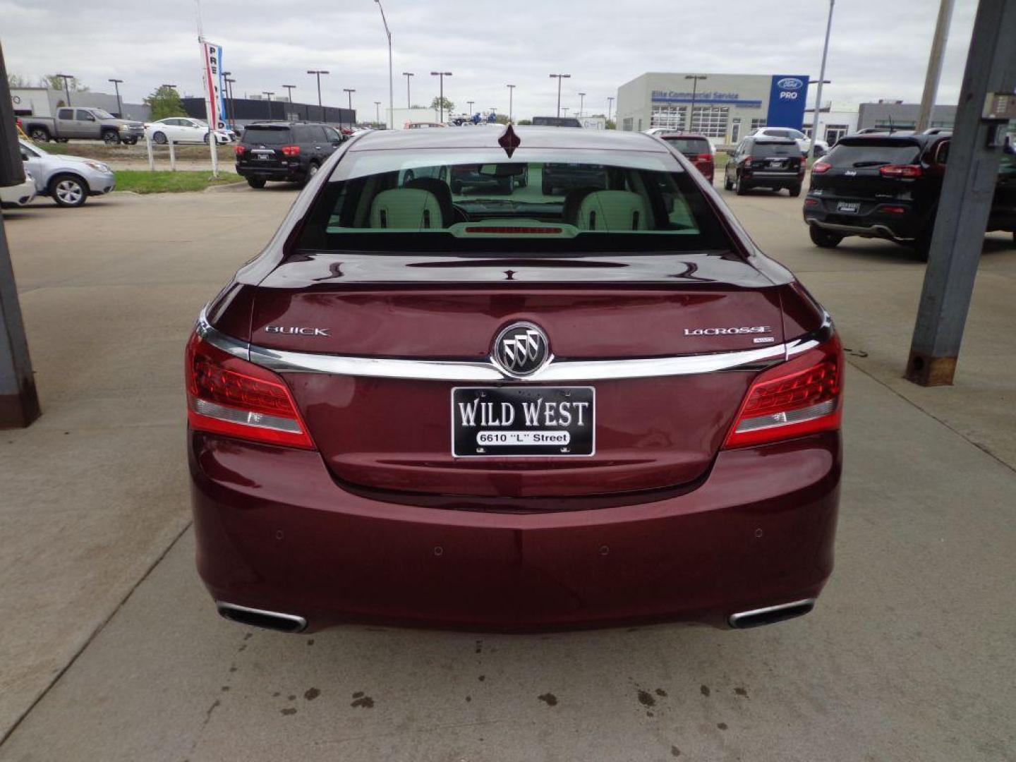 2016 RED BUICK LACROSSE (1G4GC5G37GF) with an 3.6L engine, Automatic transmission, located at 6610 L St., Omaha, NE, 68117, (402) 731-7800, 41.212872, -96.014702 - 1-OWNER, CLEAN CARFAX, LOW MILEAGE, AWD, SUNROOF, HEATED SEATS, NAV, BACKUP CAM, BOSE AUDIO, REMOTE START AND NEWER TIRES! THIS VEHICLE HAS A CLEAN TITLE WITH A FREE CARFAX PROVIDED! *****We have found that most customers do the majority of their shopping online before visiting a dealership. F - Photo#4