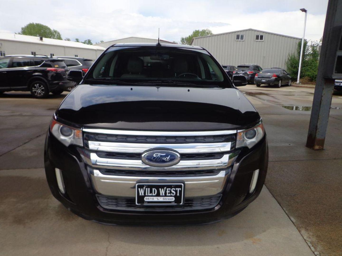 2013 BROWN FORD EDGE SEL (2FMDK4JC8DB) with an 3.5L engine, Automatic transmission, located at 6610 L St., Omaha, NE, 68117, (402) 731-7800, 41.212872, -96.014702 - CLEAN CARFAX, LOW MILEAGE, PANORAMIC SUNROOF, HEATED LEATHER AND NEWER TIRES! *****We have found that most customers do the majority of their shopping online before visiting a dealership. For this reason we feel it necessary to have a competitive price on our used vehicles right up front. We sp - Photo#1