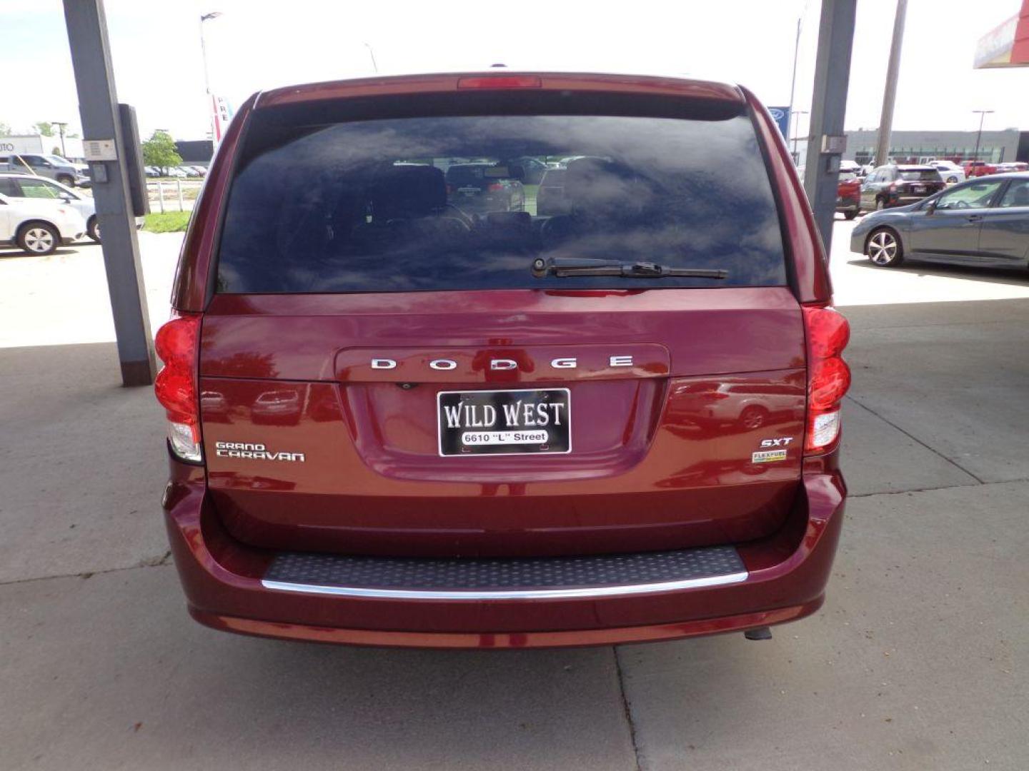 2019 MAROON DODGE GRAND CARAVAN SXT (2C4RDGCG7KR) with an 3.6L engine, Automatic transmission, located at 6610 L St., Omaha, NE, 68117, (402) 731-7800, 41.212872, -96.014702 - 2-OWNER, CLEAN CARFAX WITH REAR AIR, BACKUP CAM AND NEWER TIRES! *****We have found that most customers do the majority of their shopping online before visiting a dealership. For this reason we feel it necessary to have a competitive price on our used vehicles right up front. We spend time re - Photo#4