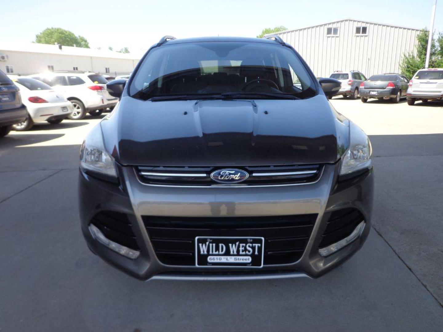 2014 GRAY FORD ESCAPE TITANIUM (1FMCU9J95EU) with an 2.0L engine, Automatic transmission, located at 6610 L St., Omaha, NE, 68117, (402) 731-7800, 41.212872, -96.014702 - 2-OWNER, CLEAN CAREFAX, LOW MILES, PANORAMIC ROOF, NAV, BACKUP CAM, REMOTE START AND NEWER TIRES! *****We have found that most customers do the majority of their shopping online before visiting a dealership. For this reason we feel it necessary to have a competitive price on our used vehicles - Photo#1