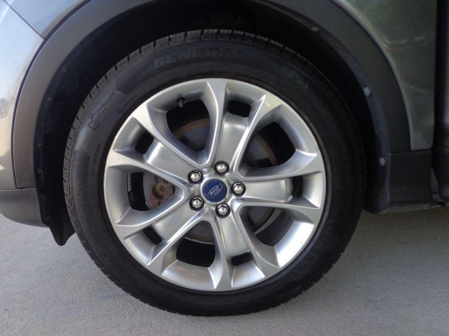 2014 GRAY FORD ESCAPE TITANIUM (1FMCU9J95EU) with an 2.0L engine, Automatic transmission, located at 6610 L St., Omaha, NE, 68117, (402) 731-7800, 41.212872, -96.014702 - 2-OWNER, CLEAN CAREFAX, LOW MILES, PANORAMIC ROOF, NAV, BACKUP CAM, REMOTE START AND NEWER TIRES! *****We have found that most customers do the majority of their shopping online before visiting a dealership. For this reason we feel it necessary to have a competitive price on our used vehicles - Photo#7