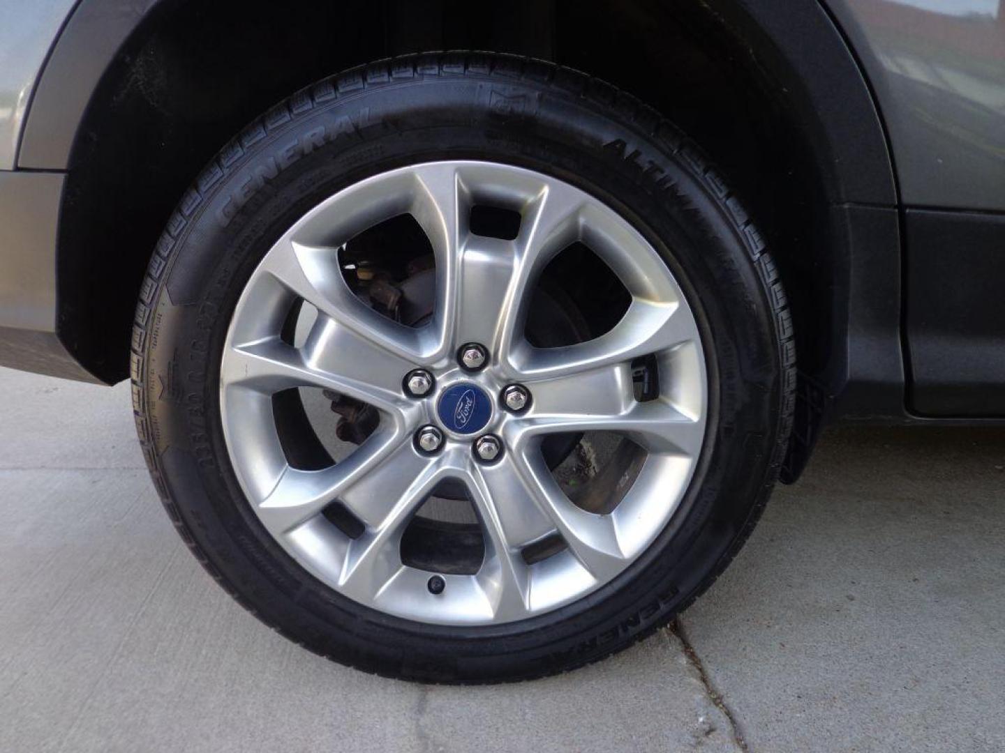 2014 GRAY FORD ESCAPE TITANIUM (1FMCU9J95EU) with an 2.0L engine, Automatic transmission, located at 6610 L St., Omaha, NE, 68117, (402) 731-7800, 41.212872, -96.014702 - 2-OWNER, CLEAN CAREFAX, LOW MILES, PANORAMIC ROOF, NAV, BACKUP CAM, REMOTE START AND NEWER TIRES! *****We have found that most customers do the majority of their shopping online before visiting a dealership. For this reason we feel it necessary to have a competitive price on our used vehicles - Photo#9