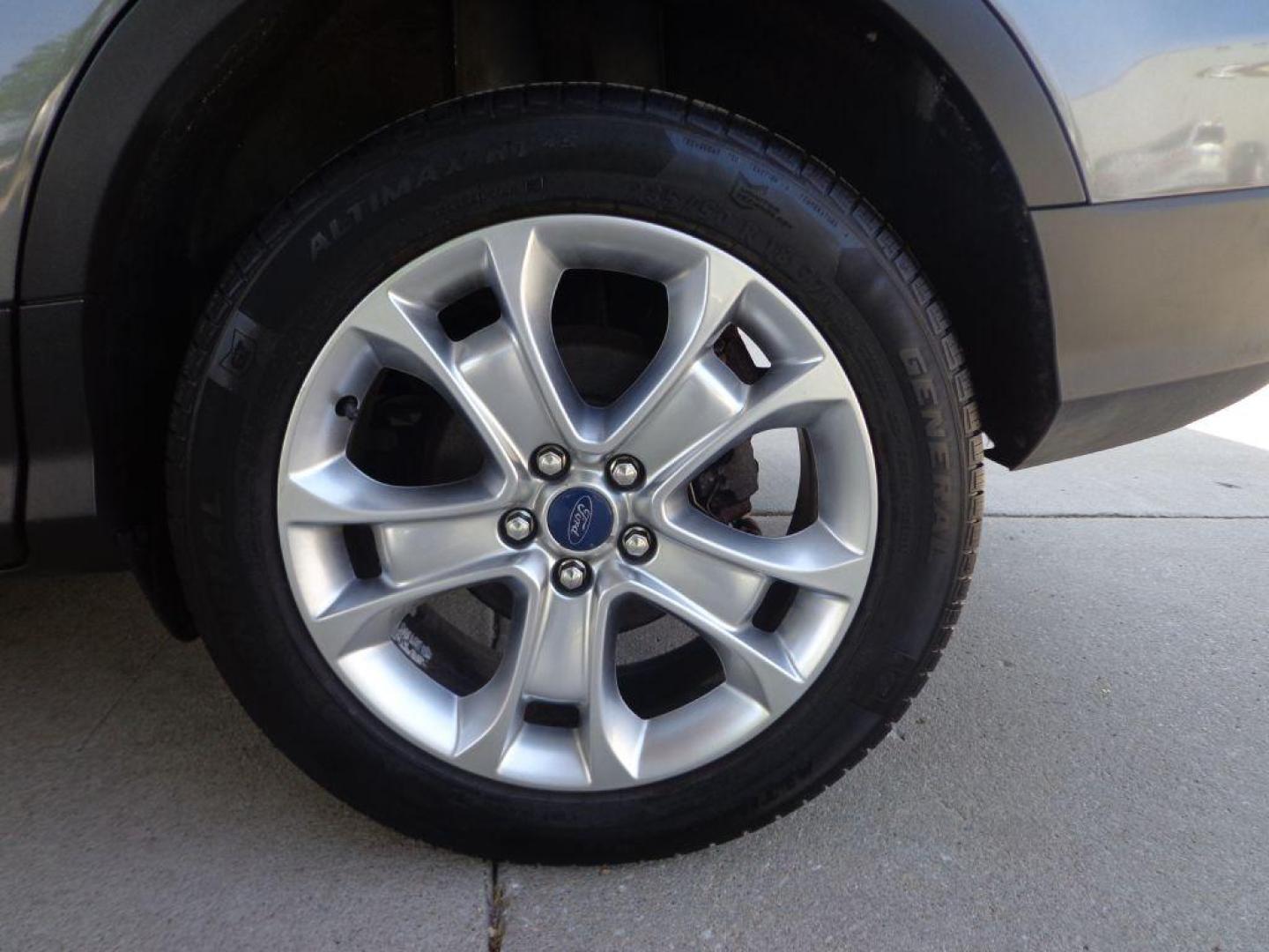 2014 GRAY FORD ESCAPE TITANIUM (1FMCU9J95EU) with an 2.0L engine, Automatic transmission, located at 6610 L St., Omaha, NE, 68117, (402) 731-7800, 41.212872, -96.014702 - 2-OWNER, CLEAN CAREFAX, LOW MILES, PANORAMIC ROOF, NAV, BACKUP CAM, REMOTE START AND NEWER TIRES! *****We have found that most customers do the majority of their shopping online before visiting a dealership. For this reason we feel it necessary to have a competitive price on our used vehicles - Photo#10