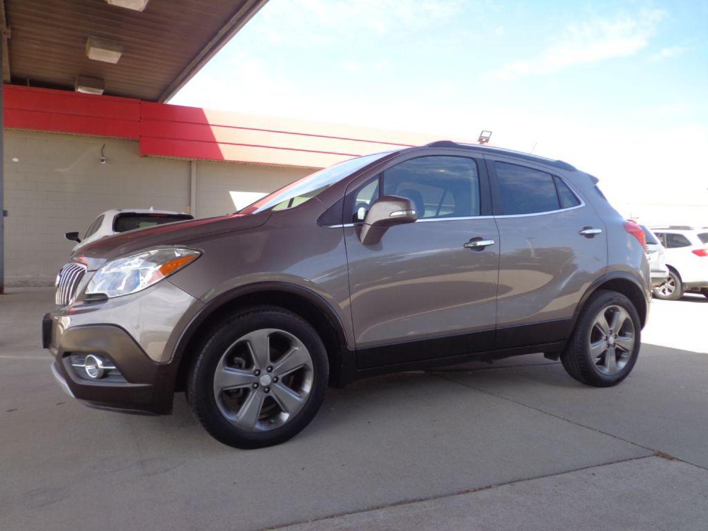 2014 BRONZE BUICK ENCORE LEATHER (KL4CJGSB5EB) with an 1.4L engine, Automatic transmission, located at 6610 L St., Omaha, NE, 68117, (402) 731-7800, 41.212872, -96.014702 - 1-OWNER, CLEAN CARFAX, LOW MILEAGE, SUNROOF, HEATED LEATHER, BACKUP CAM, NEWER TIRES AND MUCH MORE! *****We have found that most customers do the majority of their shopping online before visiting a dealership. For this reason we feel it necessary to have a competitive price on our used vehicles - Photo#0
