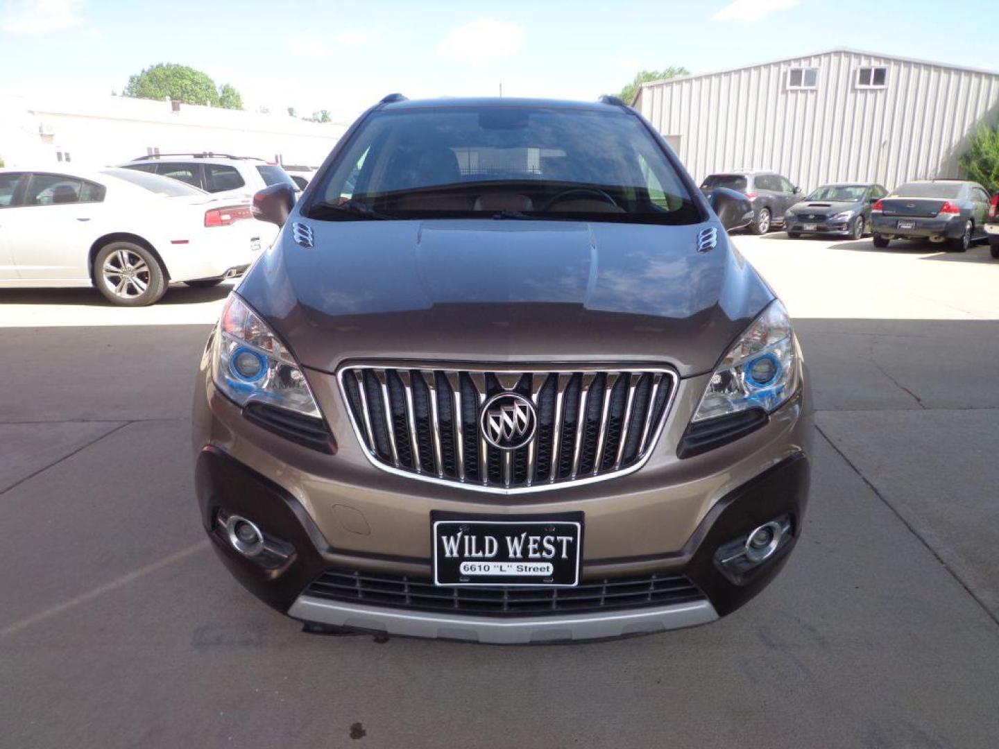 2014 BRONZE BUICK ENCORE LEATHER (KL4CJGSB5EB) with an 1.4L engine, Automatic transmission, located at 6610 L St., Omaha, NE, 68117, (402) 731-7800, 41.212872, -96.014702 - 1-OWNER, CLEAN CARFAX, LOW MILEAGE, SUNROOF, HEATED LEATHER, BACKUP CAM, NEWER TIRES AND MUCH MORE! *****We have found that most customers do the majority of their shopping online before visiting a dealership. For this reason we feel it necessary to have a competitive price on our used vehicles - Photo#1