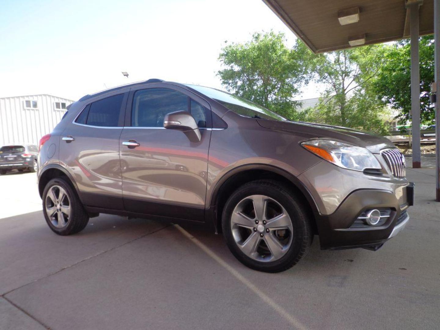 2014 BRONZE BUICK ENCORE LEATHER (KL4CJGSB5EB) with an 1.4L engine, Automatic transmission, located at 6610 L St., Omaha, NE, 68117, (402) 731-7800, 41.212872, -96.014702 - 1-OWNER, CLEAN CARFAX, LOW MILEAGE, SUNROOF, HEATED LEATHER, BACKUP CAM, NEWER TIRES AND MUCH MORE! *****We have found that most customers do the majority of their shopping online before visiting a dealership. For this reason we feel it necessary to have a competitive price on our used vehicles - Photo#2