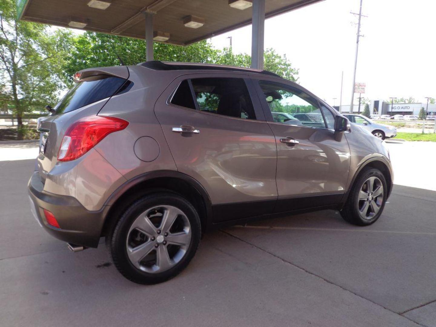2014 BRONZE BUICK ENCORE LEATHER (KL4CJGSB5EB) with an 1.4L engine, Automatic transmission, located at 6610 L St., Omaha, NE, 68117, (402) 731-7800, 41.212872, -96.014702 - 1-OWNER, CLEAN CARFAX, LOW MILEAGE, SUNROOF, HEATED LEATHER, BACKUP CAM, NEWER TIRES AND MUCH MORE! *****We have found that most customers do the majority of their shopping online before visiting a dealership. For this reason we feel it necessary to have a competitive price on our used vehicles - Photo#3