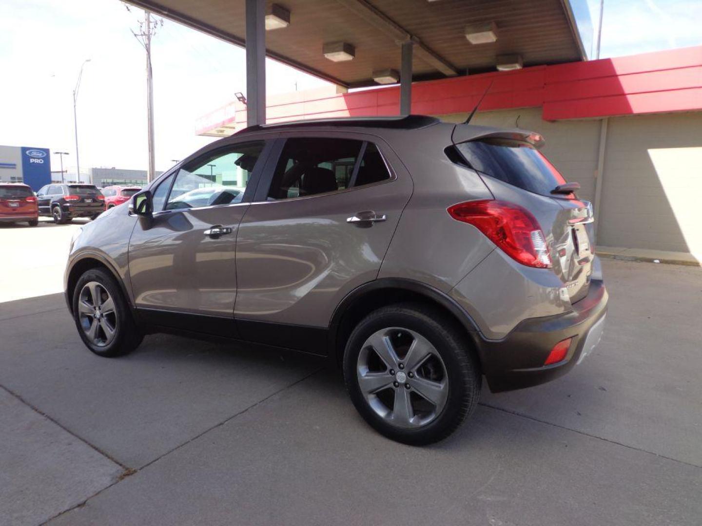 2014 BRONZE BUICK ENCORE LEATHER (KL4CJGSB5EB) with an 1.4L engine, Automatic transmission, located at 6610 L St., Omaha, NE, 68117, (402) 731-7800, 41.212872, -96.014702 - 1-OWNER, CLEAN CARFAX, LOW MILEAGE, SUNROOF, HEATED LEATHER, BACKUP CAM, NEWER TIRES AND MUCH MORE! *****We have found that most customers do the majority of their shopping online before visiting a dealership. For this reason we feel it necessary to have a competitive price on our used vehicles - Photo#5