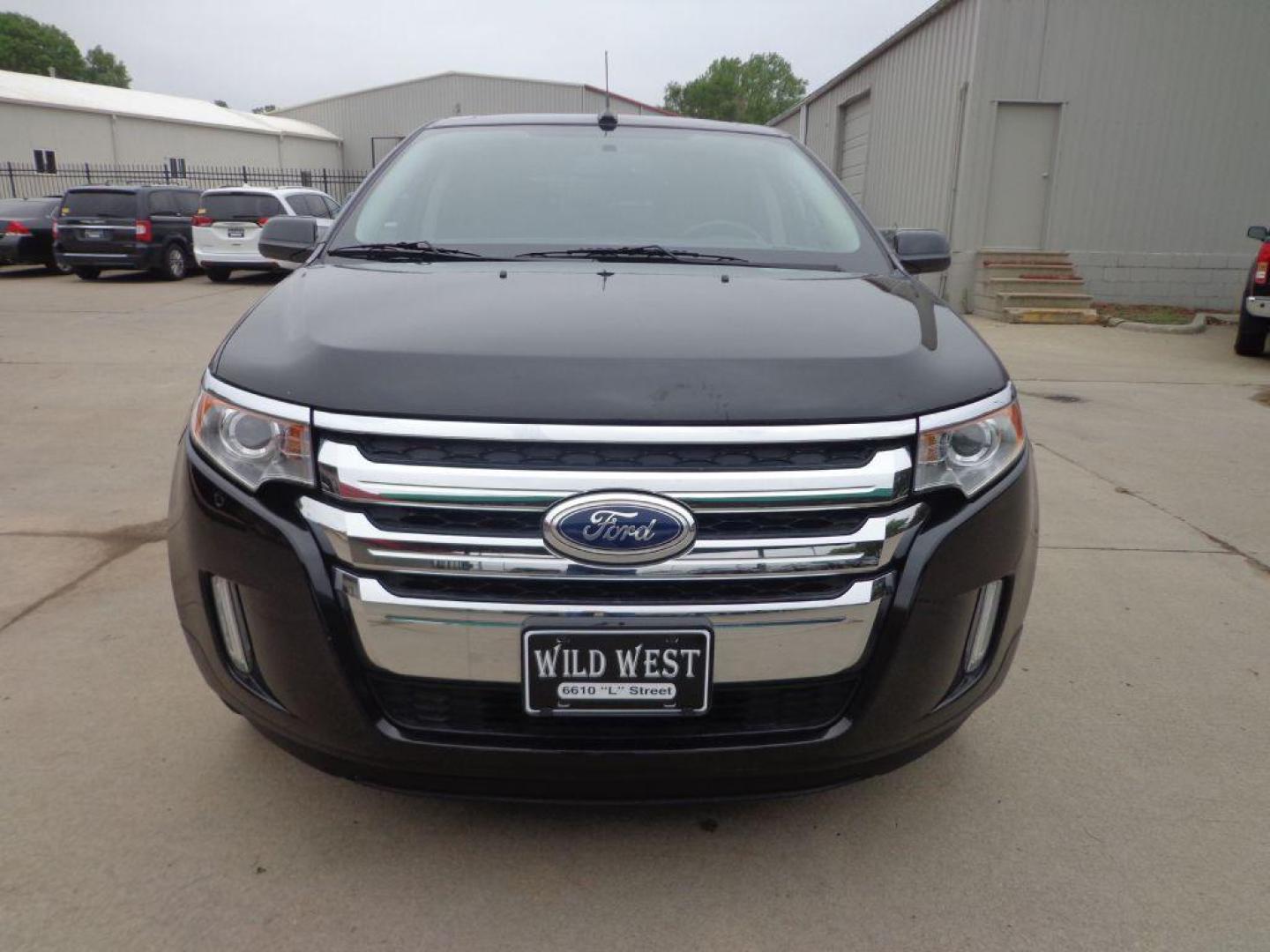 2014 BLACK FORD EDGE LIMITED (2FMDK4KC6EB) with an 3.5L engine, Automatic transmission, located at 6610 L St., Omaha, NE, 68117, (402) 731-7800, 41.212872, -96.014702 - 2-OWNER, CLEAN CARFAX, LOW MILEAGE, PANORAMIC ROOF, NAV, BACKUP CAM AND MUCH MORE! *****We have found that most customers do the majority of their shopping online before visiting a dealership. For this reason we feel it necessary to have a competitive price on our used vehicles right up front. - Photo#1