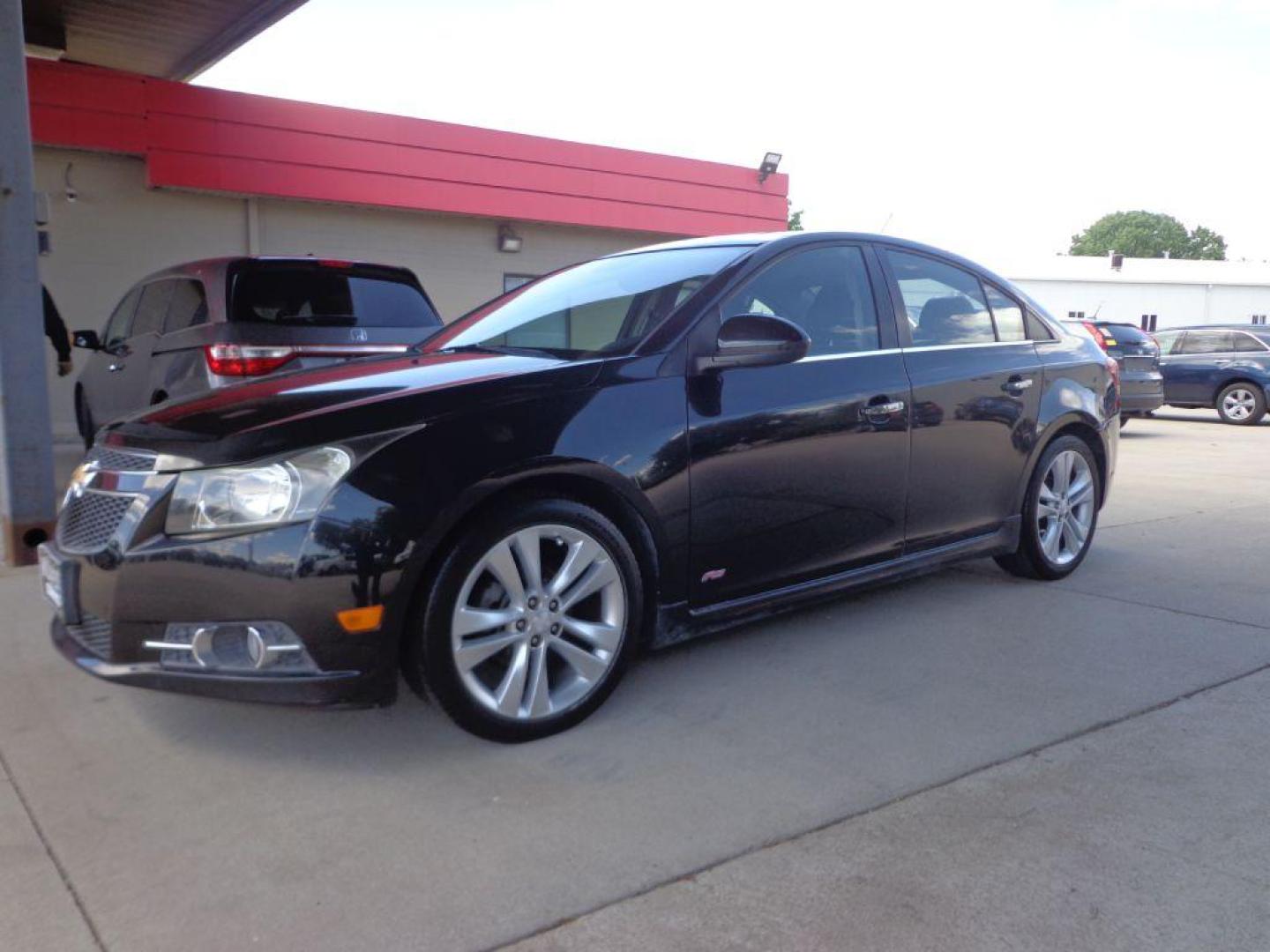 2013 BLACK CHEVROLET CRUZE LTZ (1G1PG5SB2D7) with an 1.4L engine, Automatic transmission, located at 6610 L St., Omaha, NE, 68117, (402) 731-7800, 41.212872, -96.014702 - 1-OWNER, CLEAN CARFAX , LOW MILEAGE, LEATHER, SUNROOF, NAV, BACKUP CAM AND NEWER TIRES! *****We have found that most customers do the majority of their shopping online before visiting a dealership. For this reason we feel it necessary to have a competitive price on our used vehicles right up fr - Photo#0