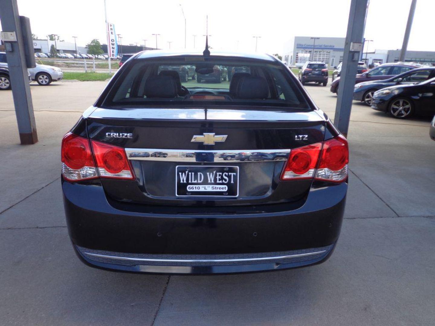 2013 BLACK CHEVROLET CRUZE LTZ (1G1PG5SB2D7) with an 1.4L engine, Automatic transmission, located at 6610 L St., Omaha, NE, 68117, (402) 731-7800, 41.212872, -96.014702 - 1-OWNER, CLEAN CARFAX , LOW MILEAGE, LEATHER, SUNROOF, NAV, BACKUP CAM AND NEWER TIRES! *****We have found that most customers do the majority of their shopping online before visiting a dealership. For this reason we feel it necessary to have a competitive price on our used vehicles right up fr - Photo#4