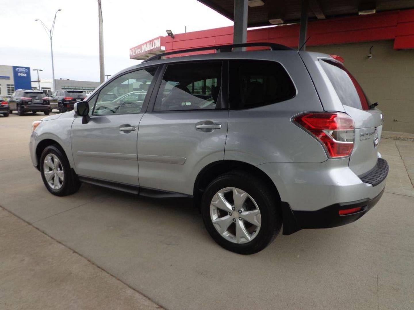 2015 SILVER SUBARU FORESTER 2.5I PREMIUM (JF2SJADC1FH) with an 2.5L engine, Automatic transmission, located at 6610 L St., Omaha, NE, 68117, (402) 731-7800, 41.212872, -96.014702 - 2-OWNER, CLEAN CARFAX, LOW MILEAGE, SUNROOF, BACKUP CAM AND HEATED SEATS!***** We have found that most customers do the majority of their shopping online before visiting a dealership. For this reason we feel it necessary to have a competitive price on our used vehicles right up front. We spen - Photo#5