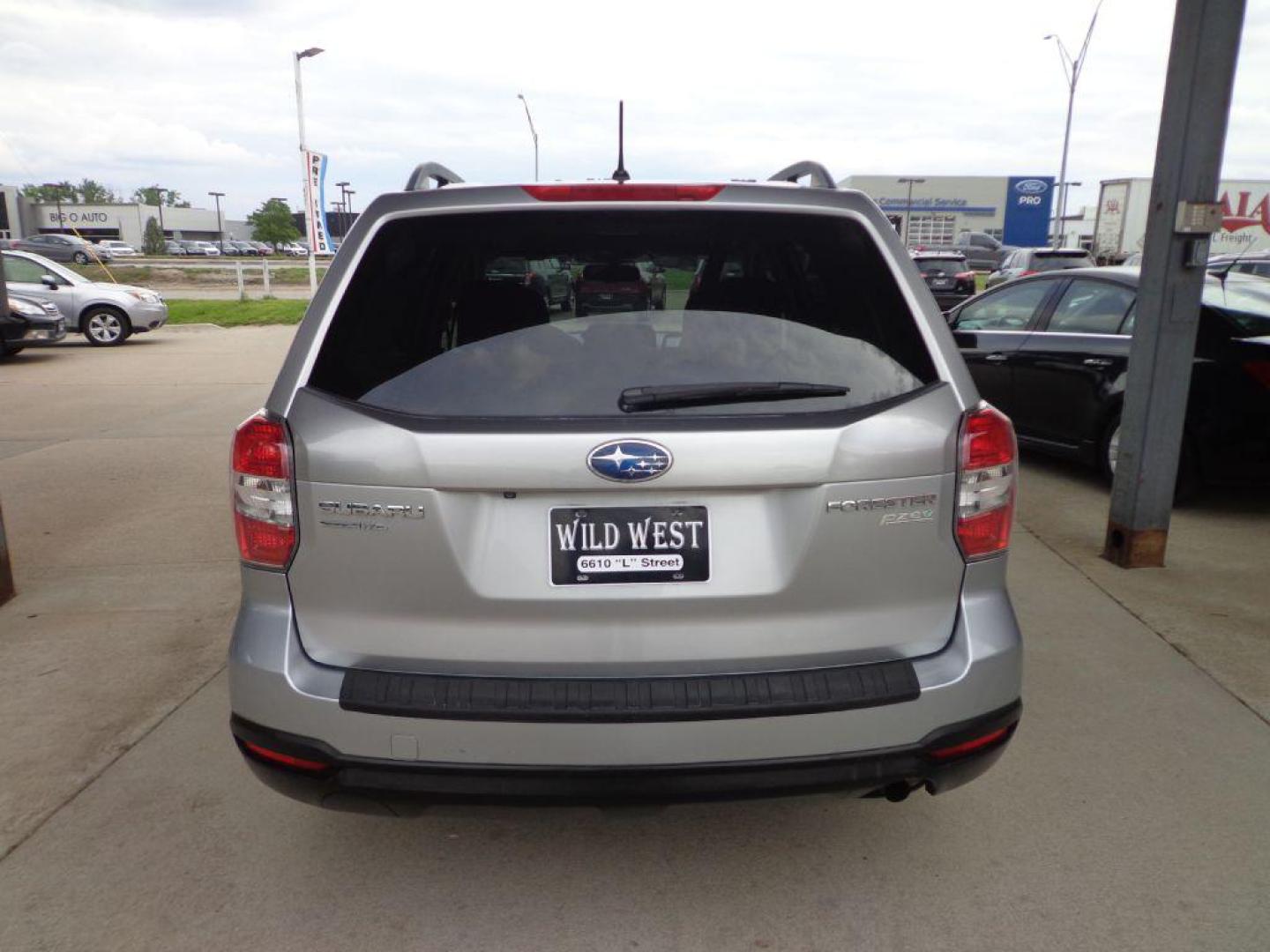 2014 SILVER SUBARU FORESTER 2.5I PREMIUM (JF2SJAEC3EH) with an 2.5L engine, Continuously Variable transmission, located at 6610 L St., Omaha, NE, 68117, (402) 731-7800, 41.212872, -96.014702 - 2-OWNER, CLEAN CARFAX, LOW MILEAGE, SUNROOF, HEATED SEATS, BACKUP CAM AND NEWER TIRES! *****We have found that most customers do the majority of their shopping online before visiting a dealership. For this reason we feel it necessary to have a competitive price on our used vehicles right up - Photo#4