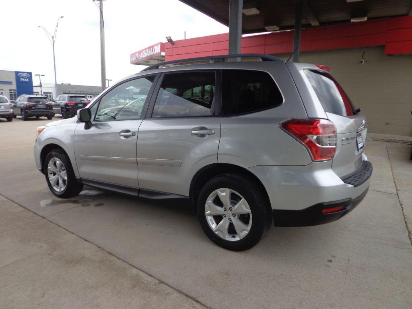 2014 SILVER SUBARU FORESTER 2.5I PREMIUM (JF2SJAEC3EH) with an 2.5L engine, Continuously Variable transmission, located at 6610 L St., Omaha, NE, 68117, (402) 731-7800, 41.212872, -96.014702 - 2-OWNER, CLEAN CARFAX, LOW MILEAGE, SUNROOF, HEATED SEATS, BACKUP CAM AND NEWER TIRES! *****We have found that most customers do the majority of their shopping online before visiting a dealership. For this reason we feel it necessary to have a competitive price on our used vehicles right up - Photo#5