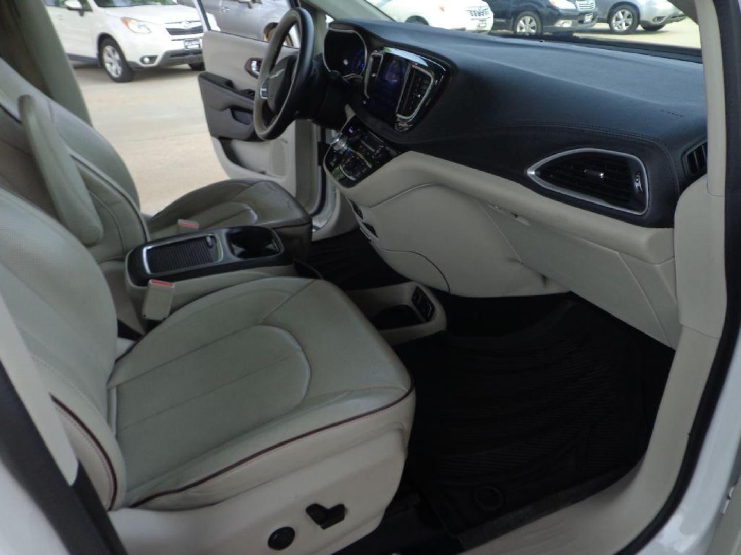 2017 WHITE CHRYSLER PACIFICA LIMITED (2C4RC1GG4HR) with an 3.6L engine, Automatic transmission, located at 6610 L St., Omaha, NE, 68117, (402) 731-7800, 41.212872, -96.014702 - 1-OWNER, CLEAN CARFAX, LOW MILEAGE, PANORAMIC ROOF, REAR ENTERTAINMENT, PREMIUM AUDIO, BLIND SPOT, PARK SENCE, COOLED FRONT SEATS, NEWER TIRES AND MUCH MORE! *****We have found that most customers do the majority of their shopping online before visiting a dealership. For this reason we feel it - Photo#17