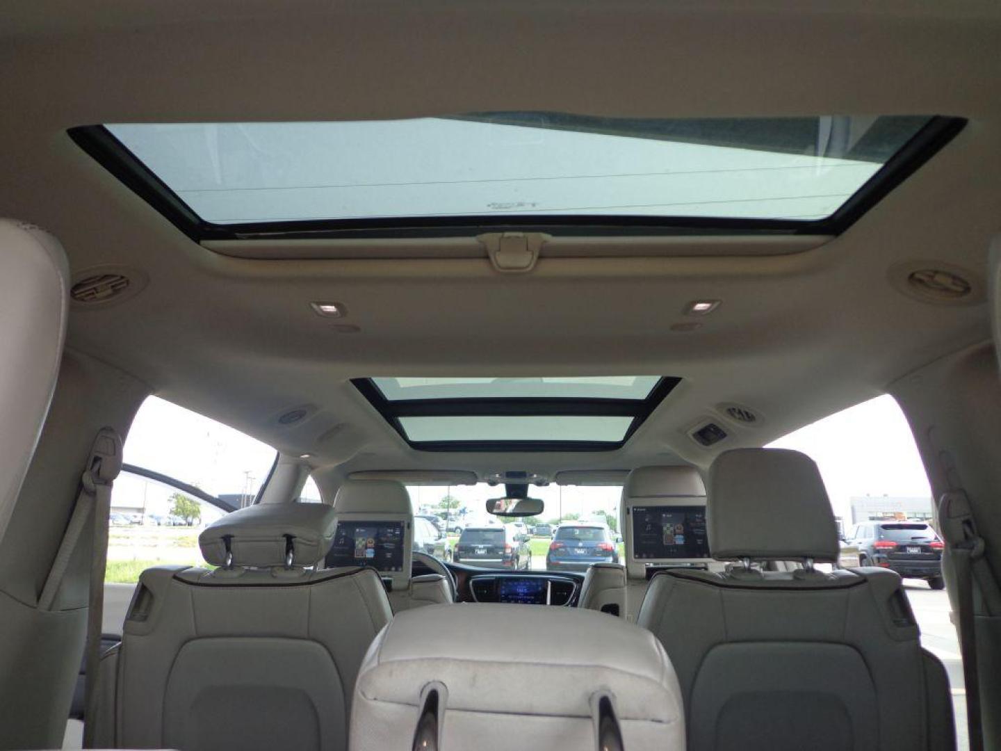 2017 WHITE CHRYSLER PACIFICA LIMITED (2C4RC1GG4HR) with an 3.6L engine, Automatic transmission, located at 6610 L St., Omaha, NE, 68117, (402) 731-7800, 41.212872, -96.014702 - 1-OWNER, CLEAN CARFAX, LOW MILEAGE, PANORAMIC ROOF, REAR ENTERTAINMENT, PREMIUM AUDIO, BLIND SPOT, PARK SENCE, COOLED FRONT SEATS, NEWER TIRES AND MUCH MORE! *****We have found that most customers do the majority of their shopping online before visiting a dealership. For this reason we feel it - Photo#23