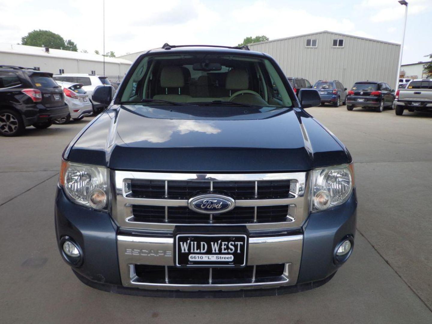 2012 BLUE FORD ESCAPE LIMITED (1FMCU9E75CK) with an 2.5L engine, Automatic transmission, located at 6610 L St., Omaha, NE, 68117, (402) 731-7800, 41.212872, -96.014702 - 1-OWNER, CLEAN CARFAX, LOW MILEAGE, SUNROOF, BACKUP CAM AND NEWER TIRES! *****We have found that most customers do the majority of their shopping online before visiting a dealership. For this reason we feel it necessary to have a competitive price on our used vehicles right up front. We spend - Photo#1