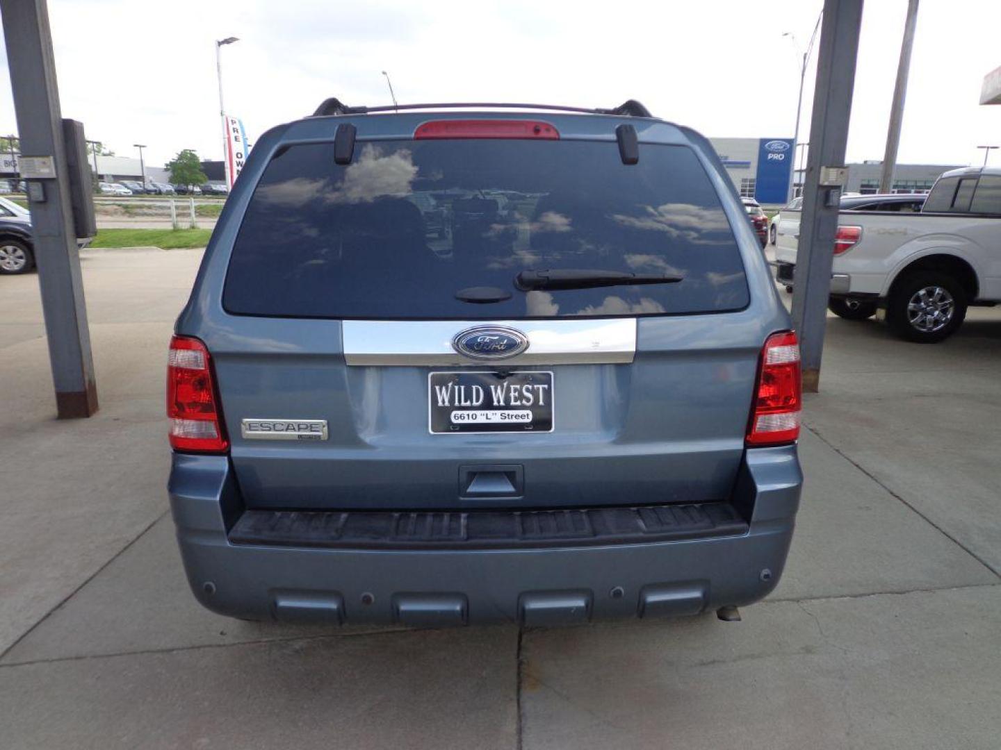 2012 BLUE FORD ESCAPE LIMITED (1FMCU9E75CK) with an 2.5L engine, Automatic transmission, located at 6610 L St., Omaha, NE, 68117, (402) 731-7800, 41.212872, -96.014702 - 1-OWNER, CLEAN CARFAX, LOW MILEAGE, SUNROOF, BACKUP CAM AND NEWER TIRES! *****We have found that most customers do the majority of their shopping online before visiting a dealership. For this reason we feel it necessary to have a competitive price on our used vehicles right up front. We spend - Photo#4