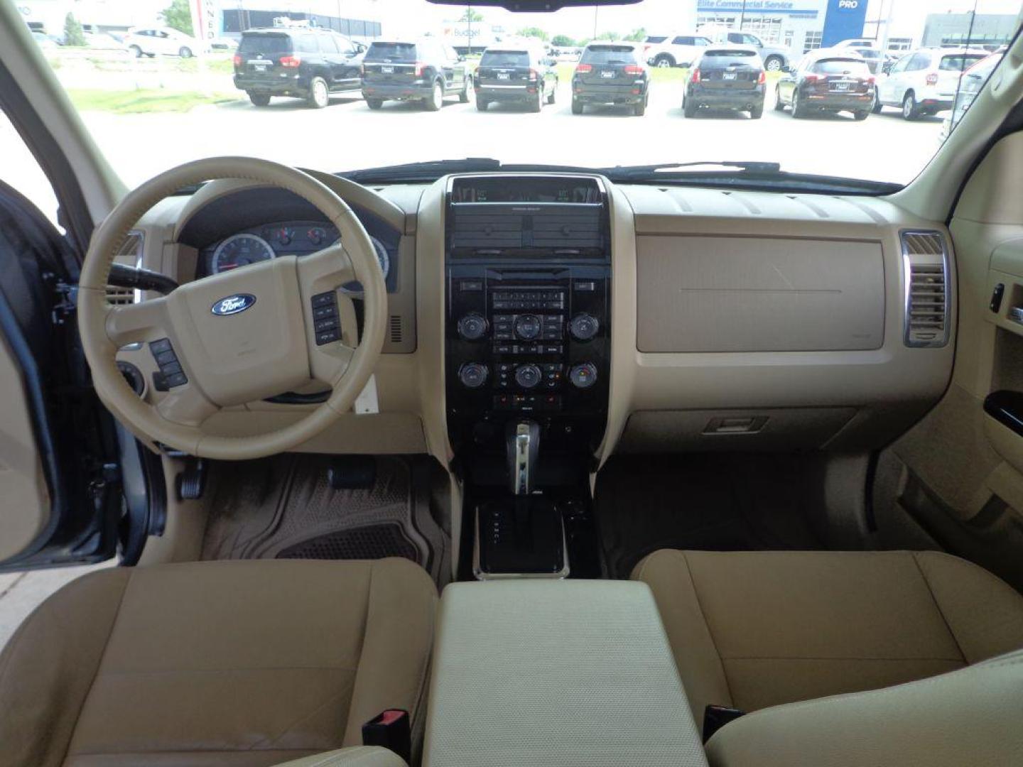 2012 BLUE FORD ESCAPE LIMITED (1FMCU9E75CK) with an 2.5L engine, Automatic transmission, located at 6610 L St., Omaha, NE, 68117, (402) 731-7800, 41.212872, -96.014702 - 1-OWNER, CLEAN CARFAX, LOW MILEAGE, SUNROOF, BACKUP CAM AND NEWER TIRES! *****We have found that most customers do the majority of their shopping online before visiting a dealership. For this reason we feel it necessary to have a competitive price on our used vehicles right up front. We spend - Photo#21