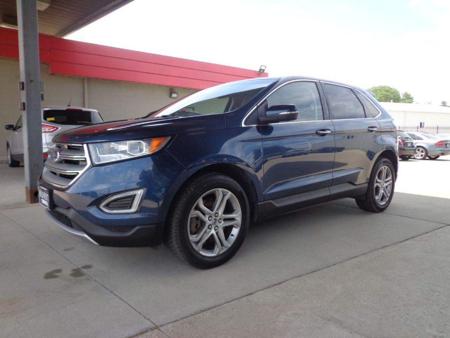 2017 BLUE FORD EDGE TITANIUM (2FMPK4K9XHB) with an 2.0L engine, Automatic transmission, located at 6610 L St., Omaha, NE, 68117, (402) 731-7800, 41.212872, -96.014702 - SHARP TITANIUM MODEL WITH A CLEAN CARFAX, LOW MILEAGE, PANORAMIC ROOF, HEATED/COOLED SEATS, HEATED STEERING WHEEL, NAV, BACKUP CAM, ADAPTIVE CRUISE, BLIND SPOT ASSIST AND A NICE SET OF MICHELINS. *****We have found that most customers do the majority of their shopping online before visiting a - Photo#0