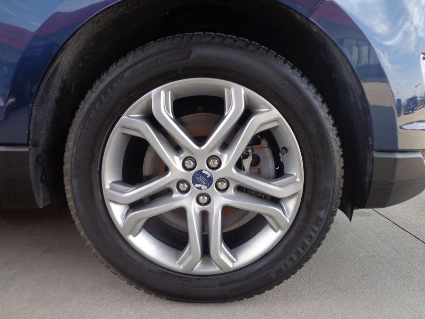 2017 BLUE FORD EDGE TITANIUM (2FMPK4K9XHB) with an 2.0L engine, Automatic transmission, located at 6610 L St., Omaha, NE, 68117, (402) 731-7800, 41.212872, -96.014702 - SHARP TITANIUM MODEL WITH A CLEAN CARFAX, LOW MILEAGE, PANORAMIC ROOF, HEATED/COOLED SEATS, HEATED STEERING WHEEL, NAV, BACKUP CAM, ADAPTIVE CRUISE, BLIND SPOT ASSIST AND A NICE SET OF MICHELINS. *****We have found that most customers do the majority of their shopping online before visiting a - Photo#8