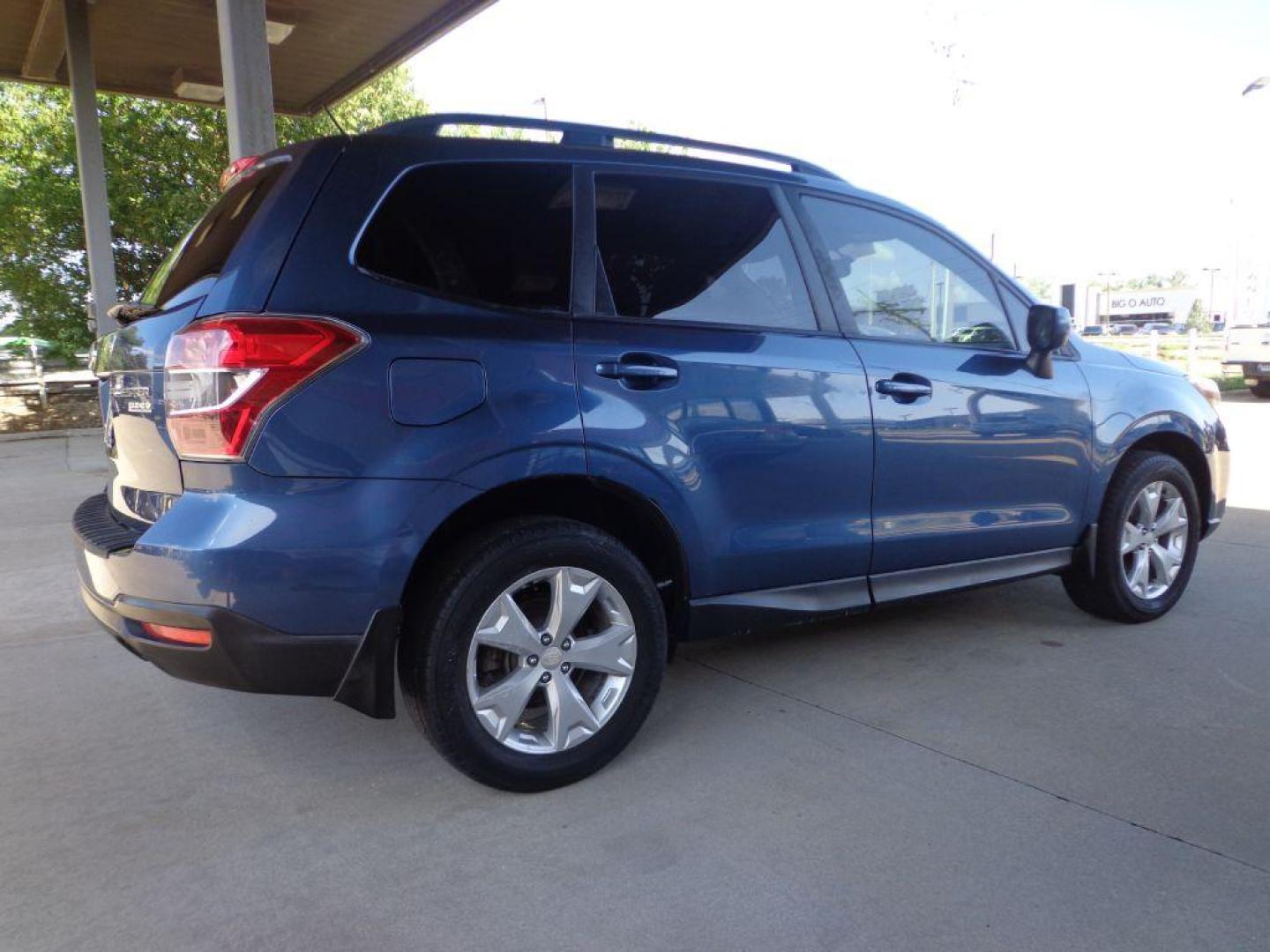 2014 BLUE SUBARU FORESTER 2.5I PREMIUM (JF2SJAEC5EH) with an 2.5L engine, Continuously Variable transmission, located at 6610 L St., Omaha, NE, 68117, (402) 731-7800, 41.212872, -96.014702 - SHARP LOW MILE RUST-FREE PREMIUM WITH LOW MILEAGE, PANORAMIC ROOF AND NEWER TIRES! *****We have found that most customers do the majority of their shopping online before visiting a dealership. For this reason we feel it necessary to have a competitive price on our used vehicles right up front. - Photo#3