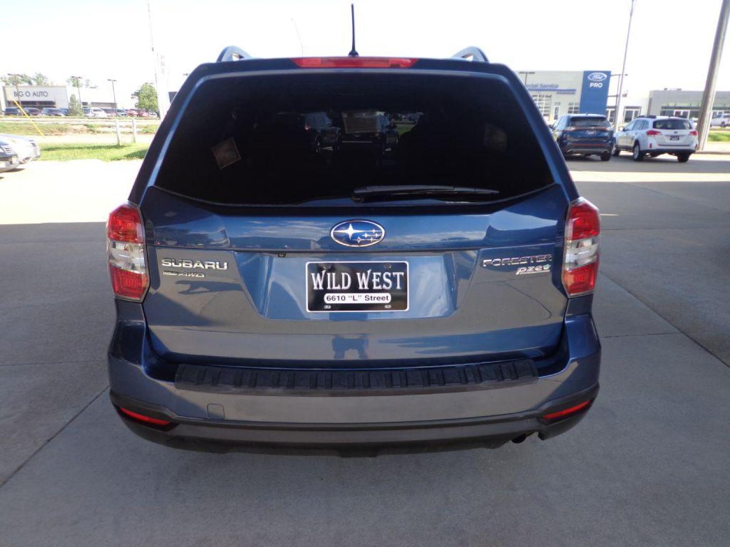 2014 BLUE SUBARU FORESTER 2.5I PREMIUM (JF2SJAEC5EH) with an 2.5L engine, Continuously Variable transmission, located at 6610 L St., Omaha, NE, 68117, (402) 731-7800, 41.212872, -96.014702 - SHARP LOW MILE RUST-FREE PREMIUM WITH LOW MILEAGE, PANORAMIC ROOF AND NEWER TIRES! *****We have found that most customers do the majority of their shopping online before visiting a dealership. For this reason we feel it necessary to have a competitive price on our used vehicles right up front. - Photo#4