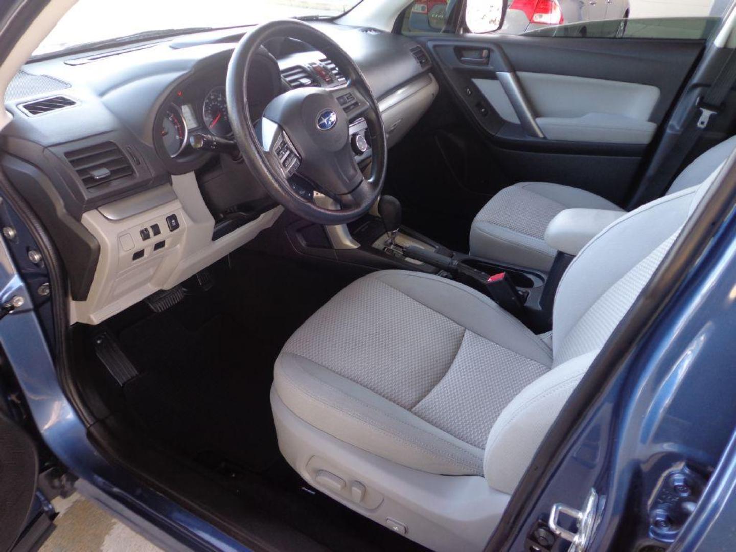 2014 BLUE SUBARU FORESTER 2.5I PREMIUM (JF2SJAEC5EH) with an 2.5L engine, Continuously Variable transmission, located at 6610 L St., Omaha, NE, 68117, (402) 731-7800, 41.212872, -96.014702 - SHARP LOW MILE RUST-FREE PREMIUM WITH LOW MILEAGE, PANORAMIC ROOF AND NEWER TIRES! *****We have found that most customers do the majority of their shopping online before visiting a dealership. For this reason we feel it necessary to have a competitive price on our used vehicles right up front. - Photo#14