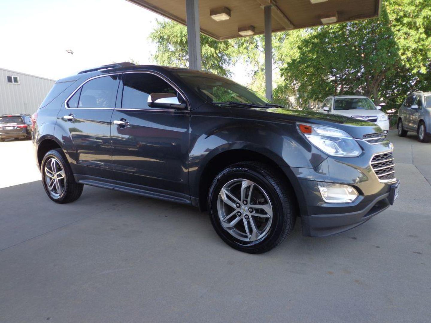 2017 GRAY CHEVROLET EQUINOX PREMIER (2GNFLGE33H6) with an 3.6L engine, Automatic transmission, located at 6610 L St., Omaha, NE, 68117, (402) 731-7800, 41.212872, -96.014702 - THIS VEHICLE HAS A CLEAN TITLE WITH A FREE CARFAX PROVIDED! SHARP LOW MILE PREMIER MODEL WITH A CLEAN CARFAX, HEATED LEATHER, SUNROOF, BLIND SPOT ASSIST, PREMIUM AUDIO AND NEWER TIRES! *****We have found that most customers do the majority of their shopping online before visiting a dealership. - Photo#2