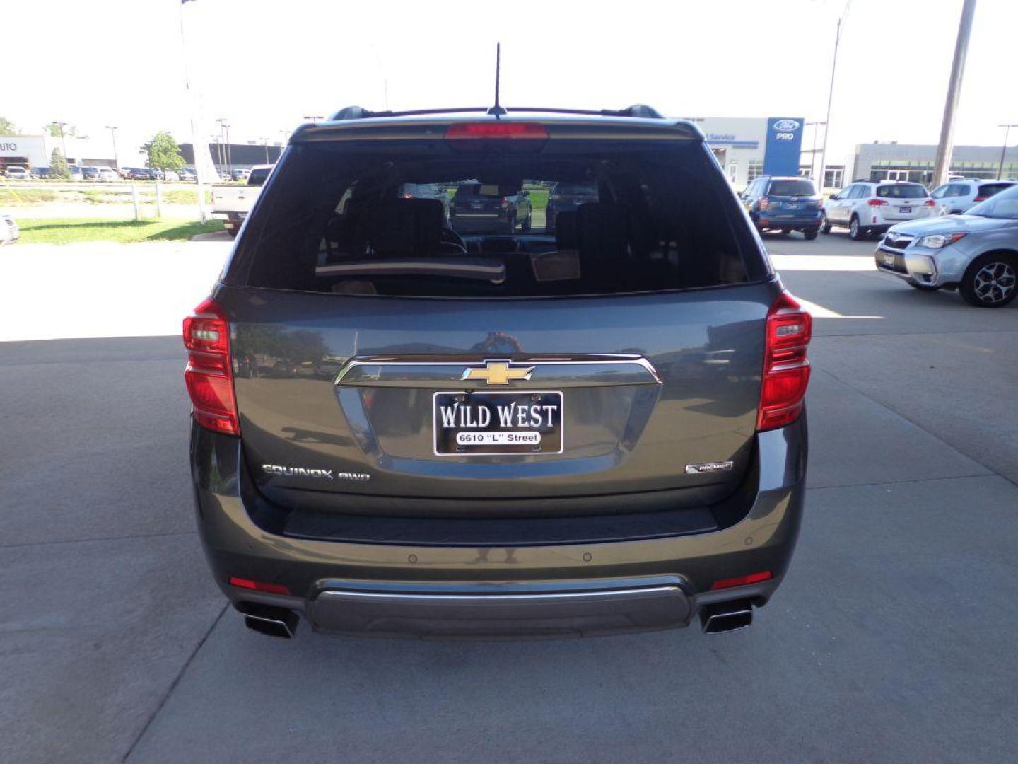 2017 GRAY CHEVROLET EQUINOX PREMIER (2GNFLGE33H6) with an 3.6L engine, Automatic transmission, located at 6610 L St., Omaha, NE, 68117, (402) 731-7800, 41.212872, -96.014702 - THIS VEHICLE HAS A CLEAN TITLE WITH A FREE CARFAX PROVIDED! SHARP LOW MILE PREMIER MODEL WITH A CLEAN CARFAX, HEATED LEATHER, SUNROOF, BLIND SPOT ASSIST, PREMIUM AUDIO AND NEWER TIRES! *****We have found that most customers do the majority of their shopping online before visiting a dealership. - Photo#4