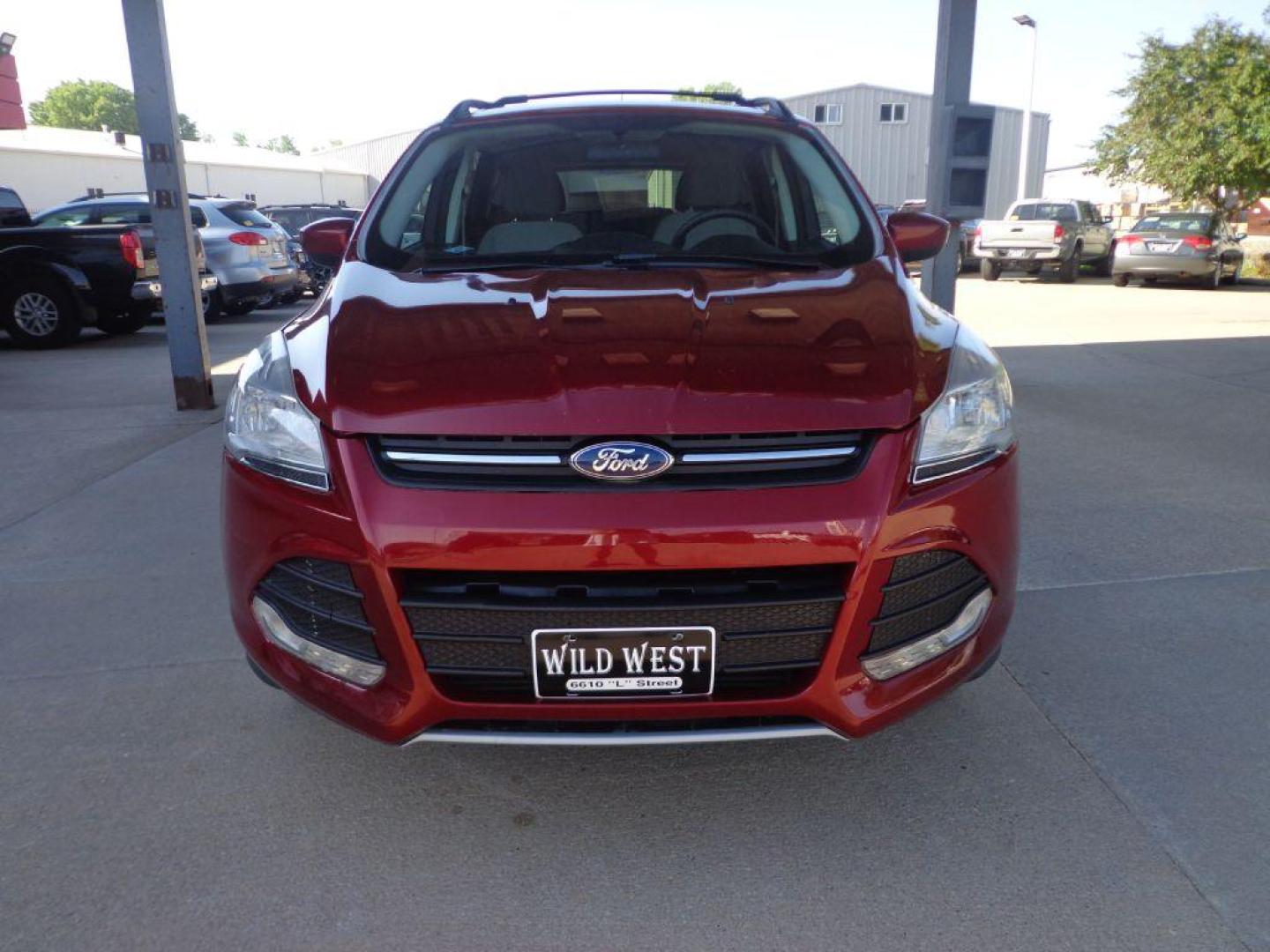 2013 RED FORD ESCAPE SE (1FMCU9G9XDU) with an 2.0L engine, Automatic transmission, located at 6610 L St., Omaha, NE, 68117, (402) 731-7800, 41.212872, -96.014702 - FRESH TRADE-IN WITH A CLEAN CARFAX, PRE-INSPECTED READY TO GO! *****We have found that most customers do the majority of their shopping online before visiting a dealership. For this reason we feel it necessary to have a competitive price on our used vehicles right up front. We spend time resear - Photo#1