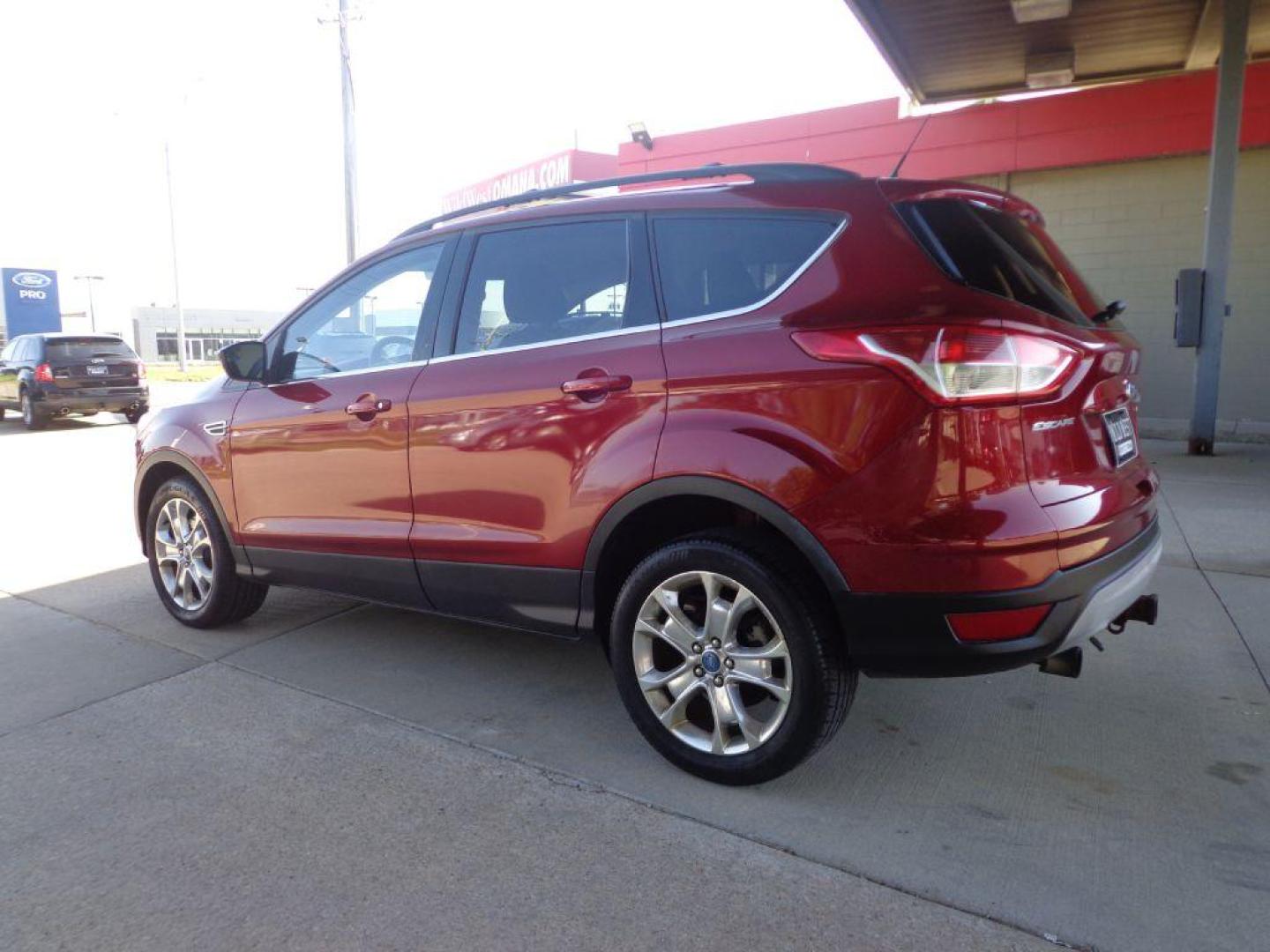 2013 RED FORD ESCAPE SE (1FMCU9G9XDU) with an 2.0L engine, Automatic transmission, located at 6610 L St., Omaha, NE, 68117, (402) 731-7800, 41.212872, -96.014702 - FRESH TRADE-IN WITH A CLEAN CARFAX, PRE-INSPECTED READY TO GO! *****We have found that most customers do the majority of their shopping online before visiting a dealership. For this reason we feel it necessary to have a competitive price on our used vehicles right up front. We spend time resear - Photo#5